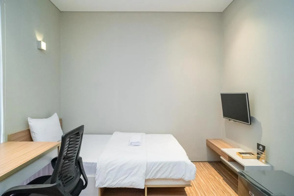 Bed in Three J Residence