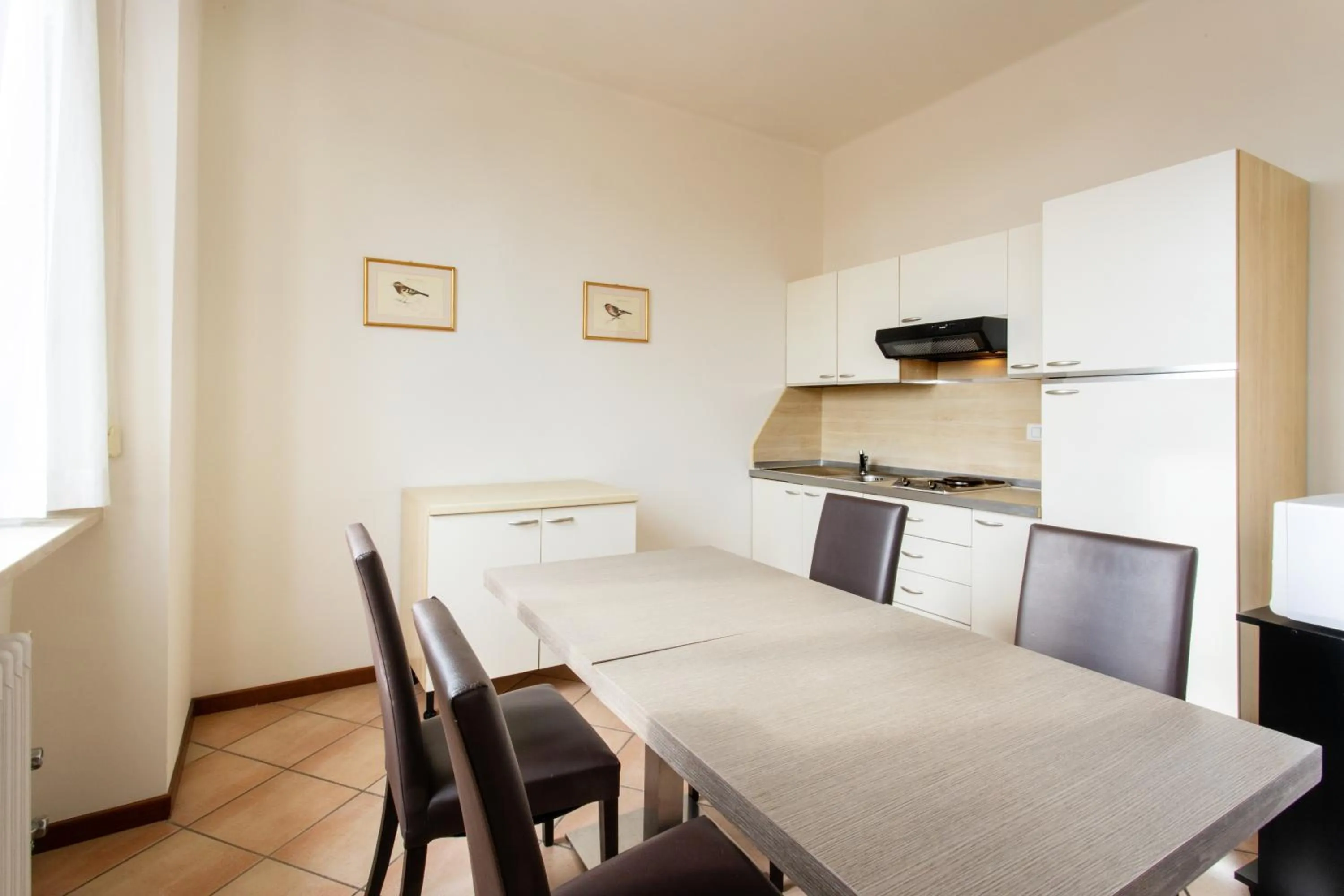 Kitchen or kitchenette in Residenza Cavour
