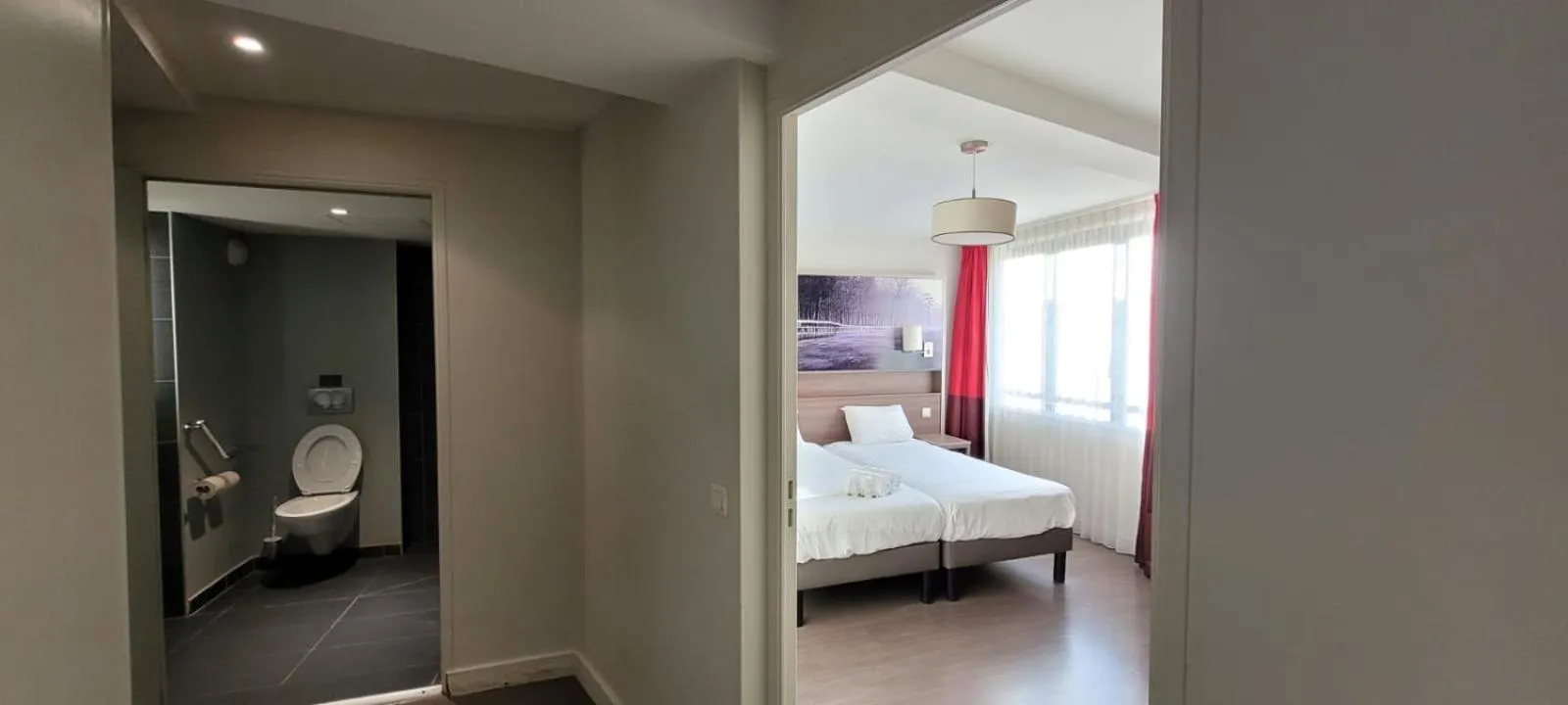 Photo of the whole room, Bed in Adagio Caen Centre