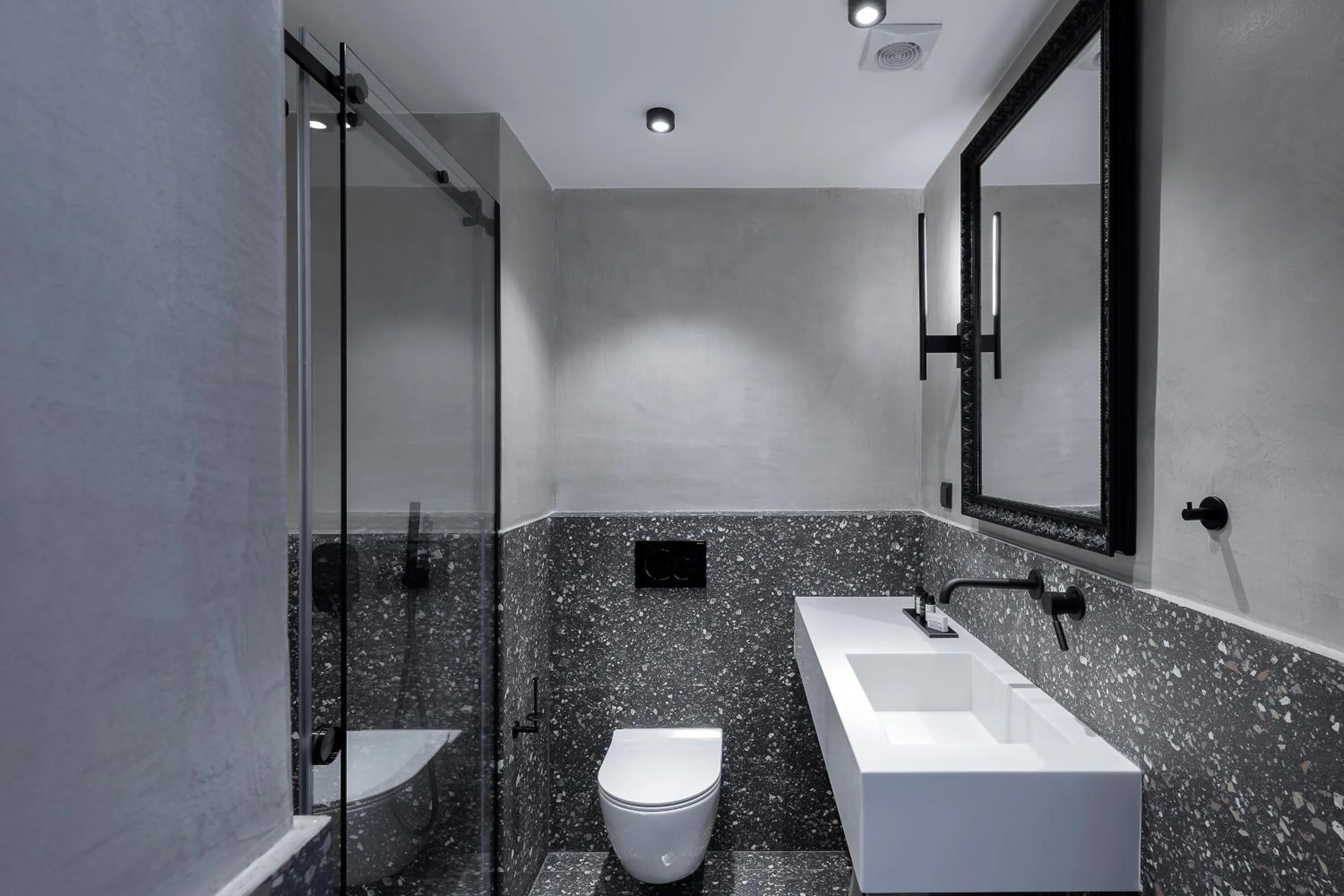 Bathroom in The Athenians Art Apartments