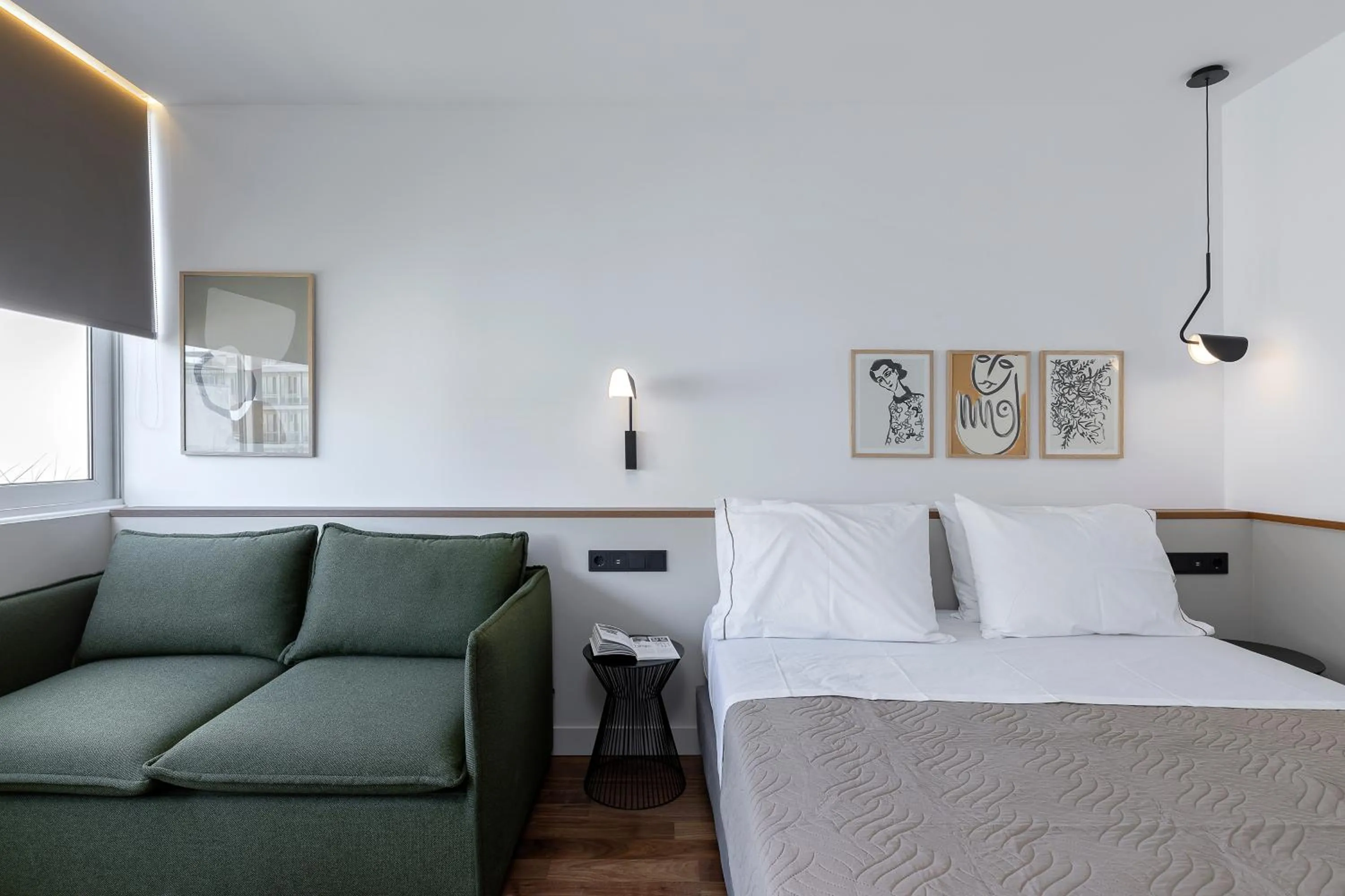 Bed in The Athenians Art Apartments