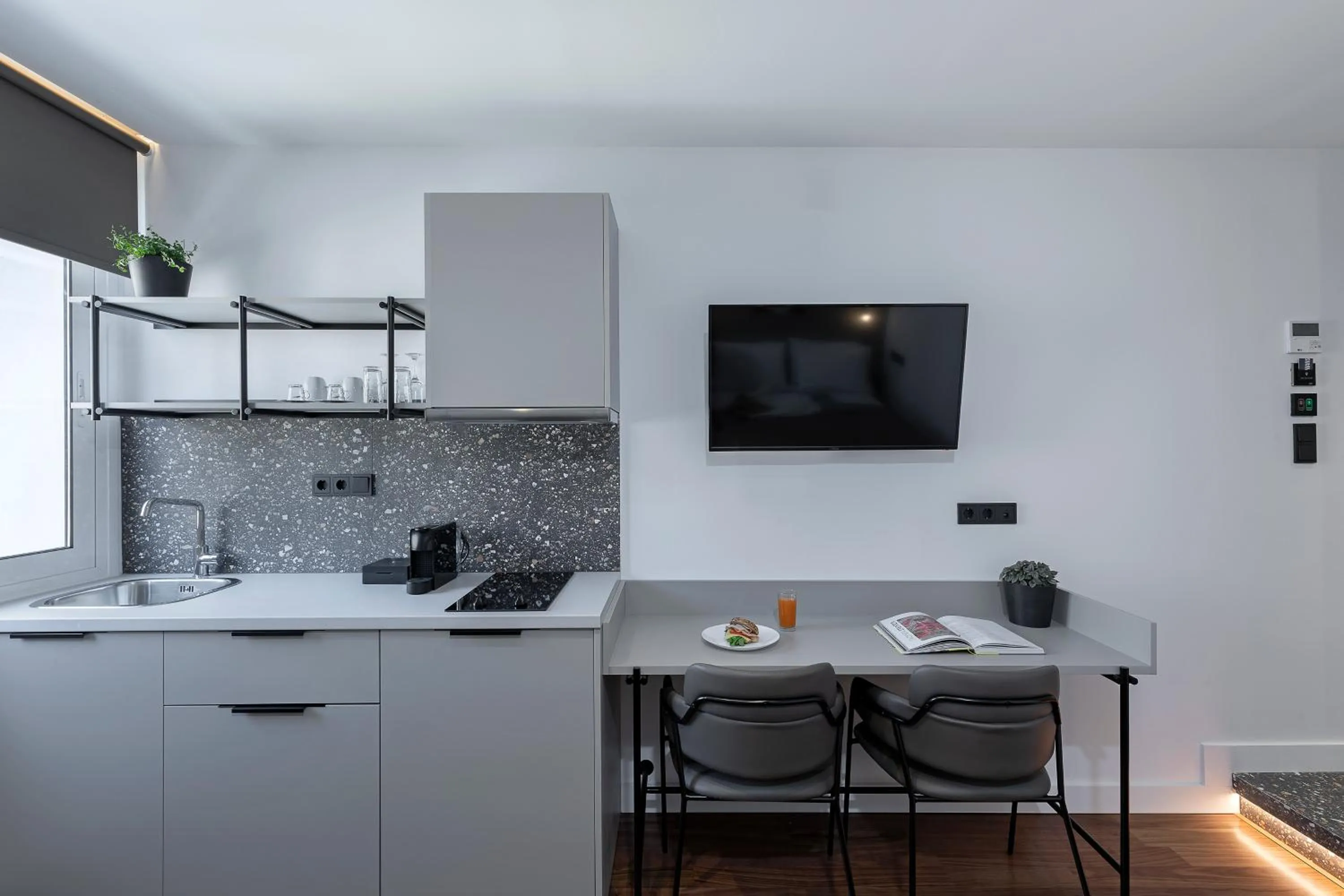 Kitchen or kitchenette in The Athenians Art Apartments