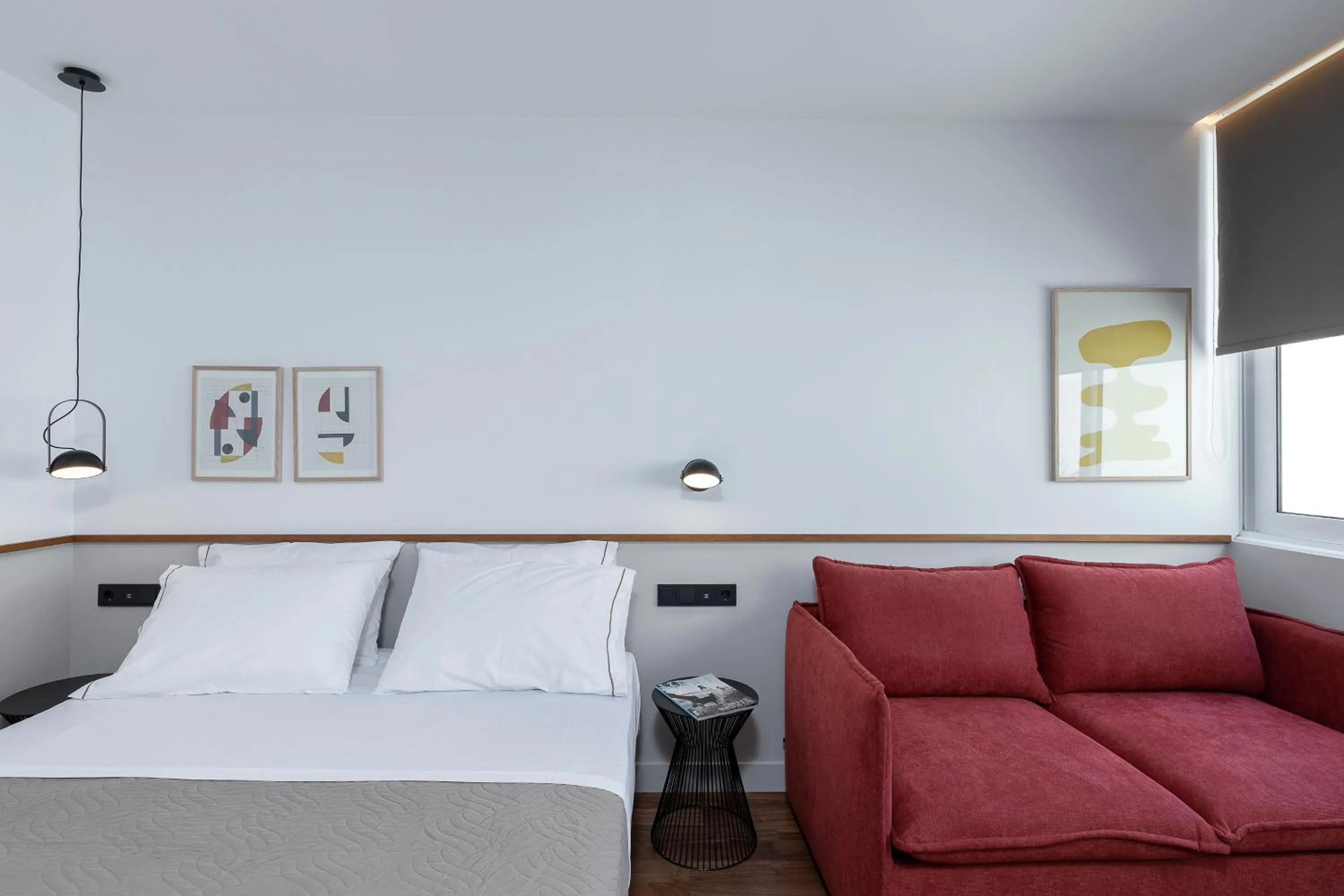 Bed in The Athenians Art Apartments