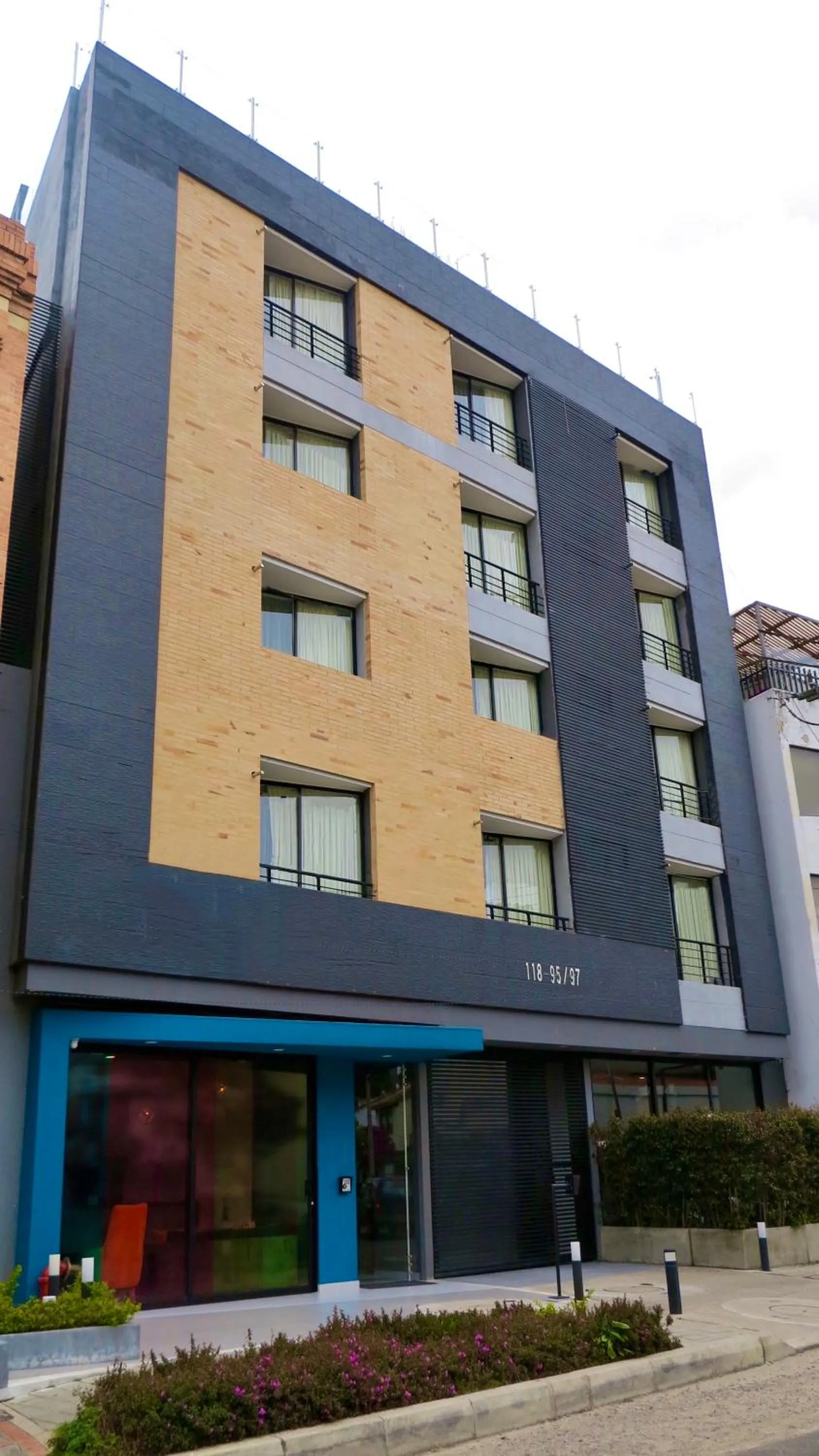 Property building in Suites Home 118 By SHG