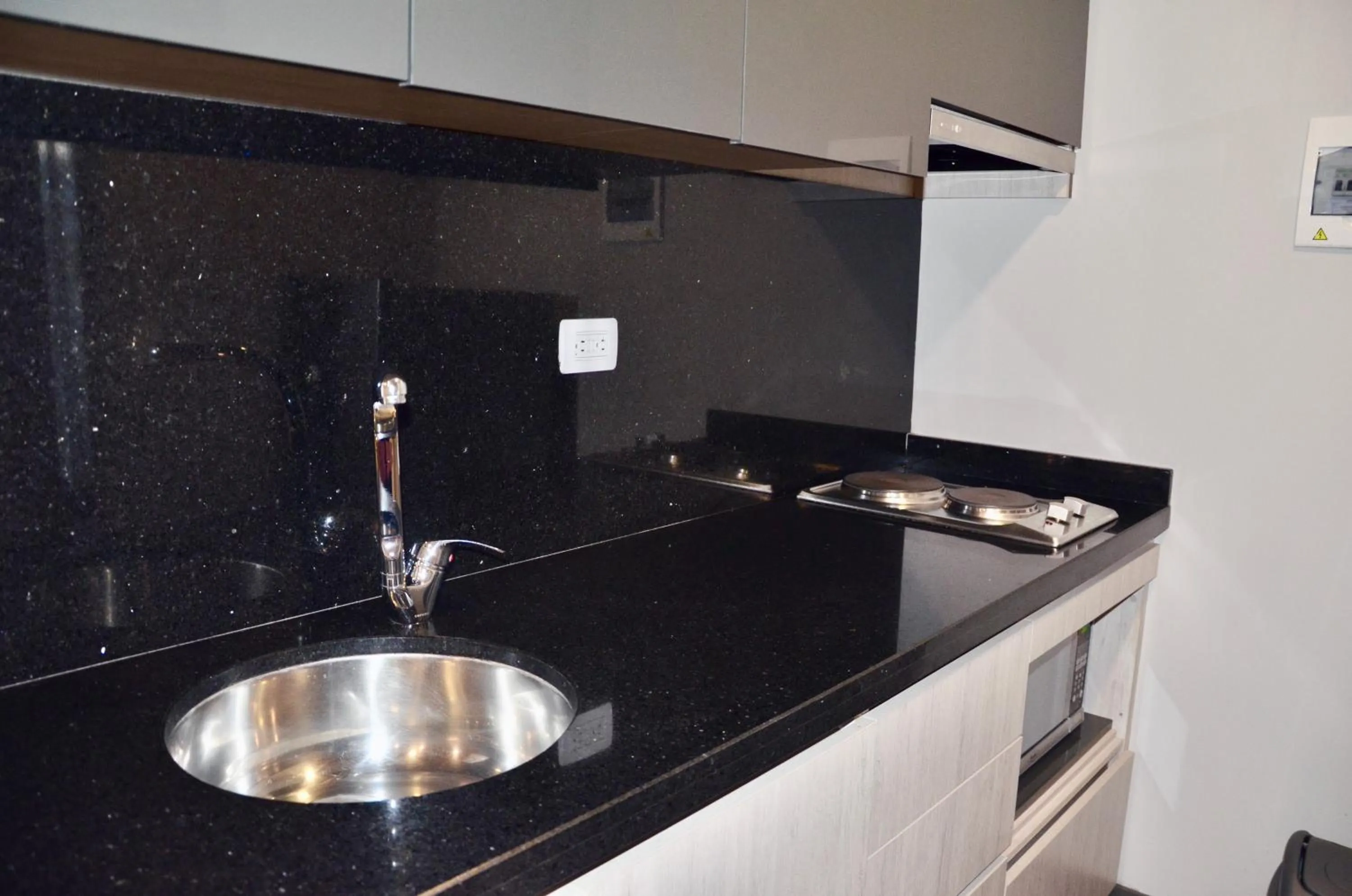 Kitchen or kitchenette in Suites Home 118 By SHG