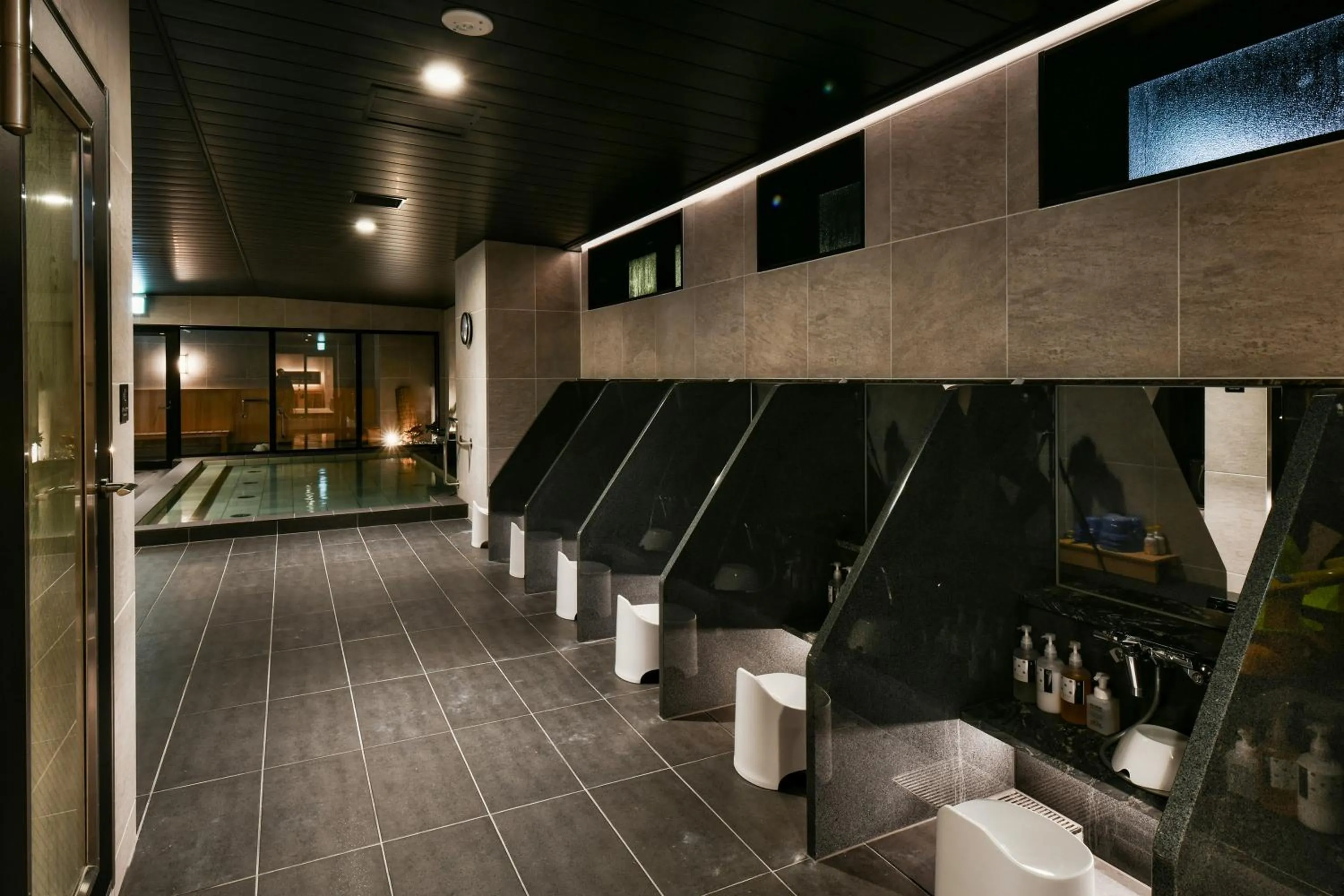 Public Bath in REF Matsuyama City Station by VESSEL HOTELS