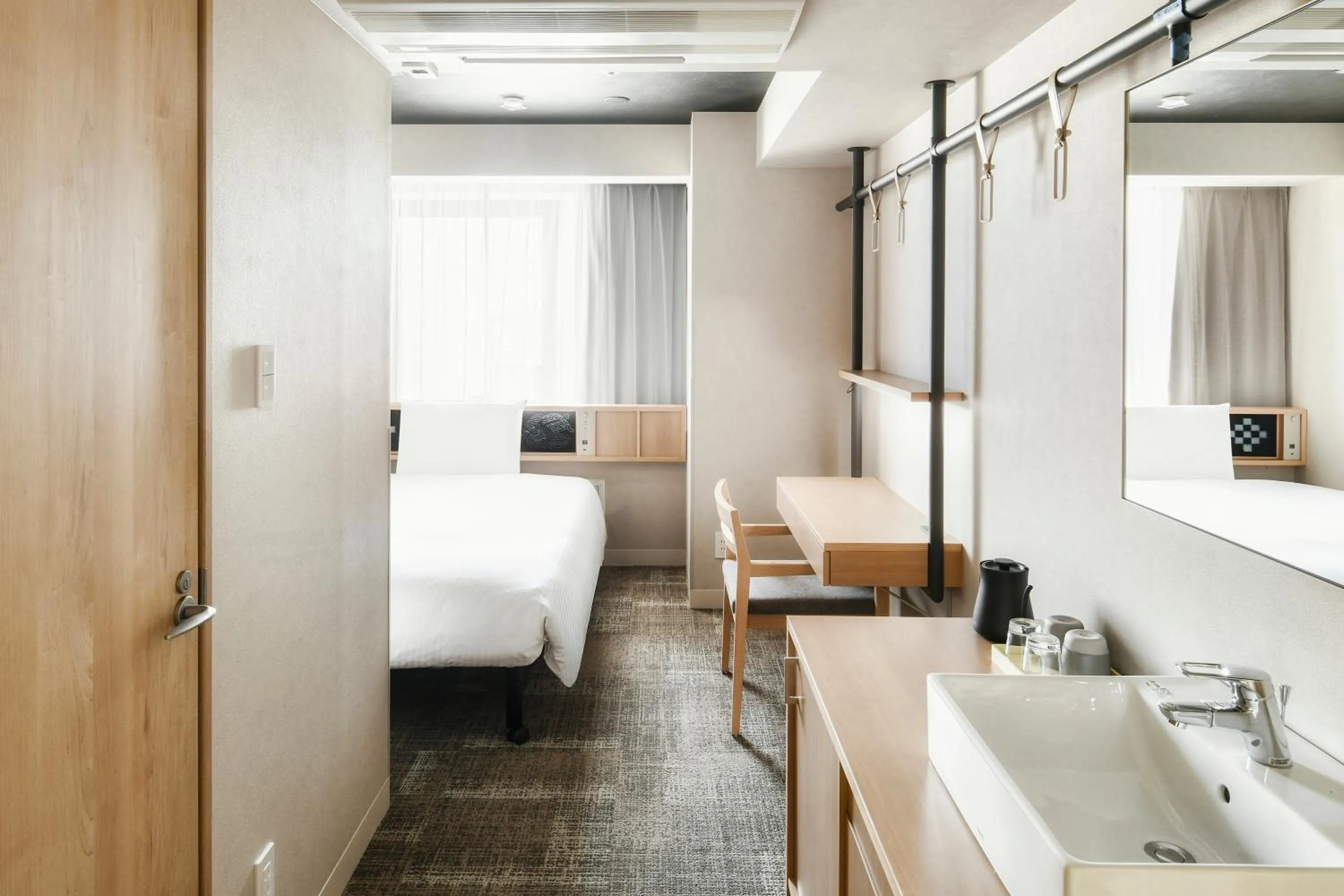 Photo of the whole room, Bed in REF Matsuyama City Station by VESSEL HOTELS