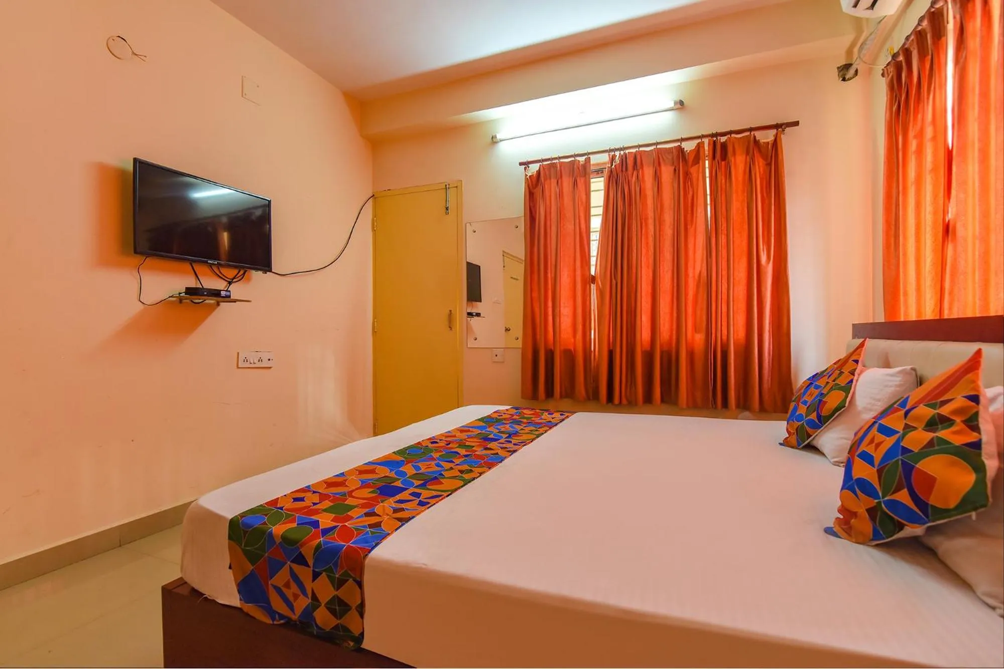 Bed in FabHotel Capital Casa