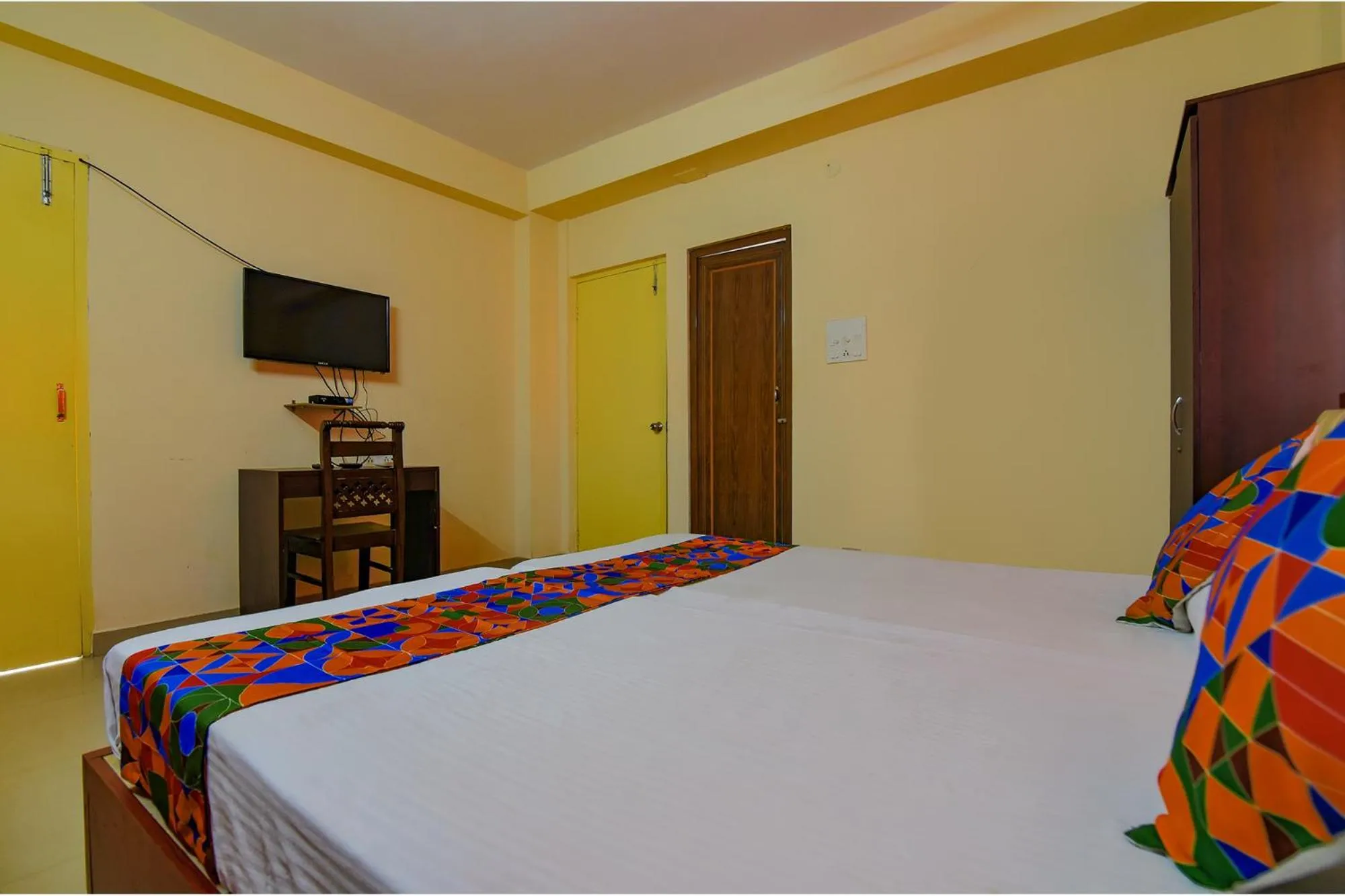 Bed in FabHotel Capital Casa