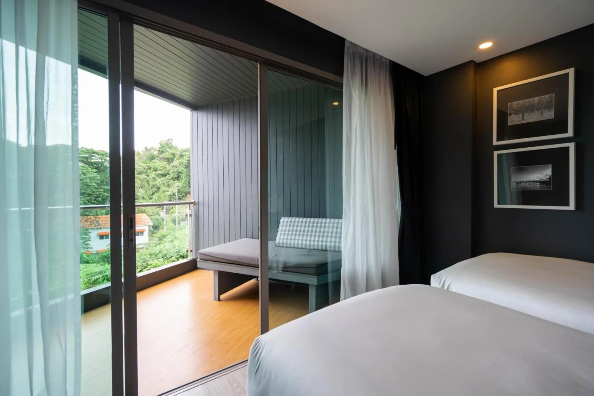Bed in Foto Hotel Phuket Beachfront