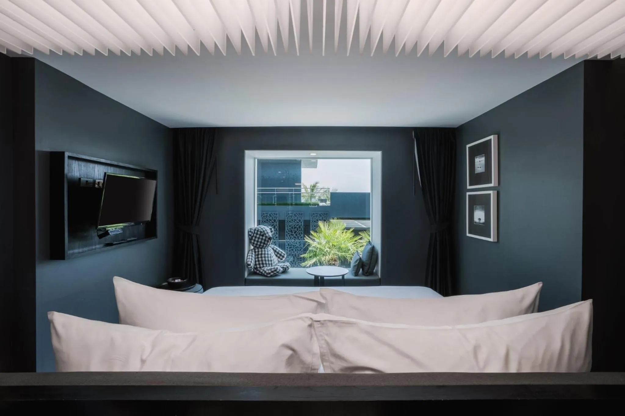 Bedroom in Foto Hotel Phuket Beachfront