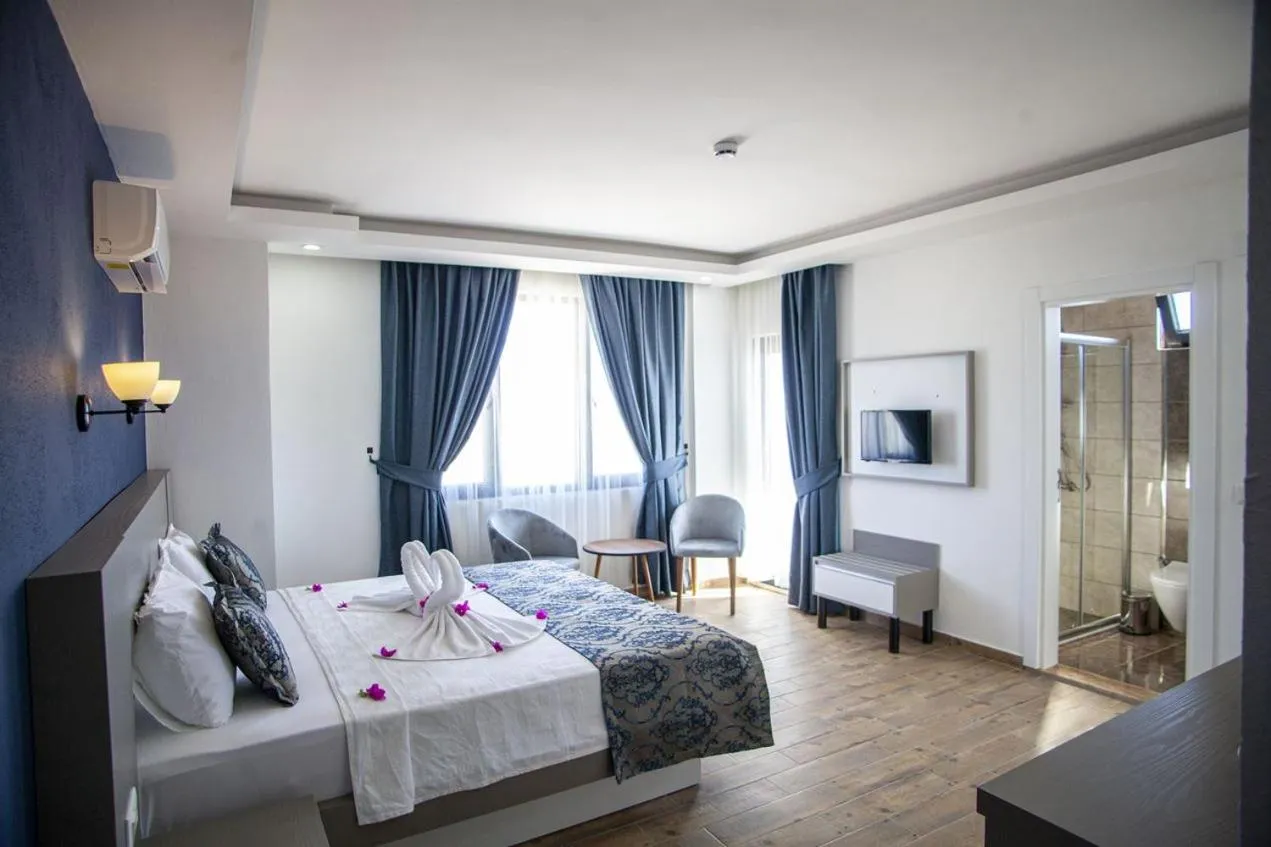 Bed in Demyra Boutique Hotel