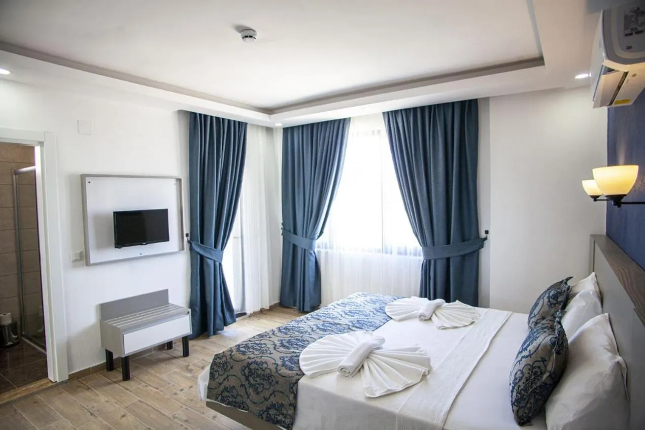 Bed in Demyra Boutique Hotel