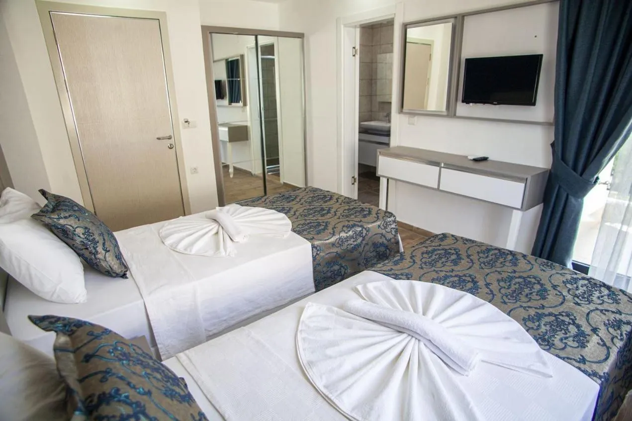 Bed in Demyra Boutique Hotel