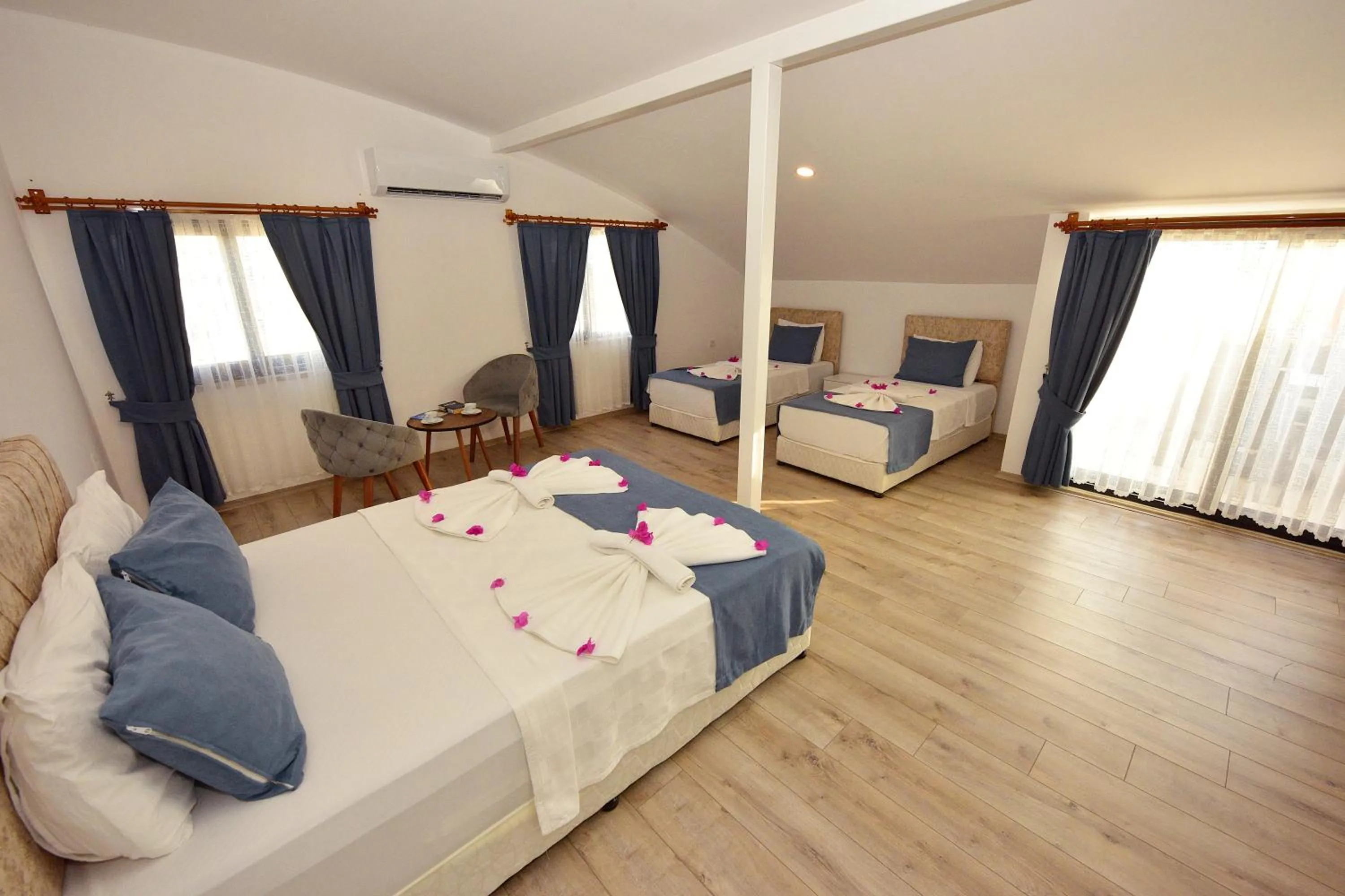 Bed in Demyra Boutique Hotel