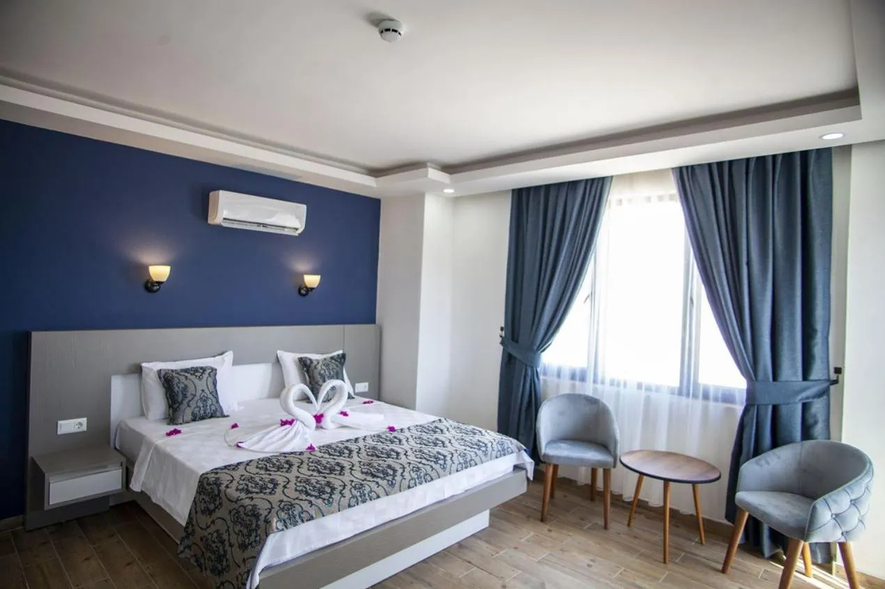 Bed in Demyra Boutique Hotel