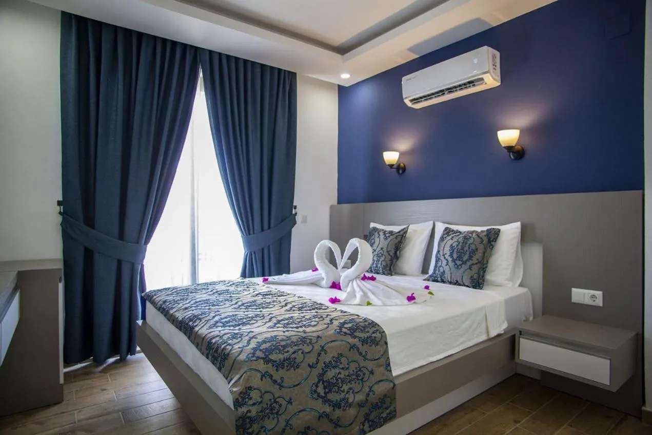 Bed in Demyra Boutique Hotel