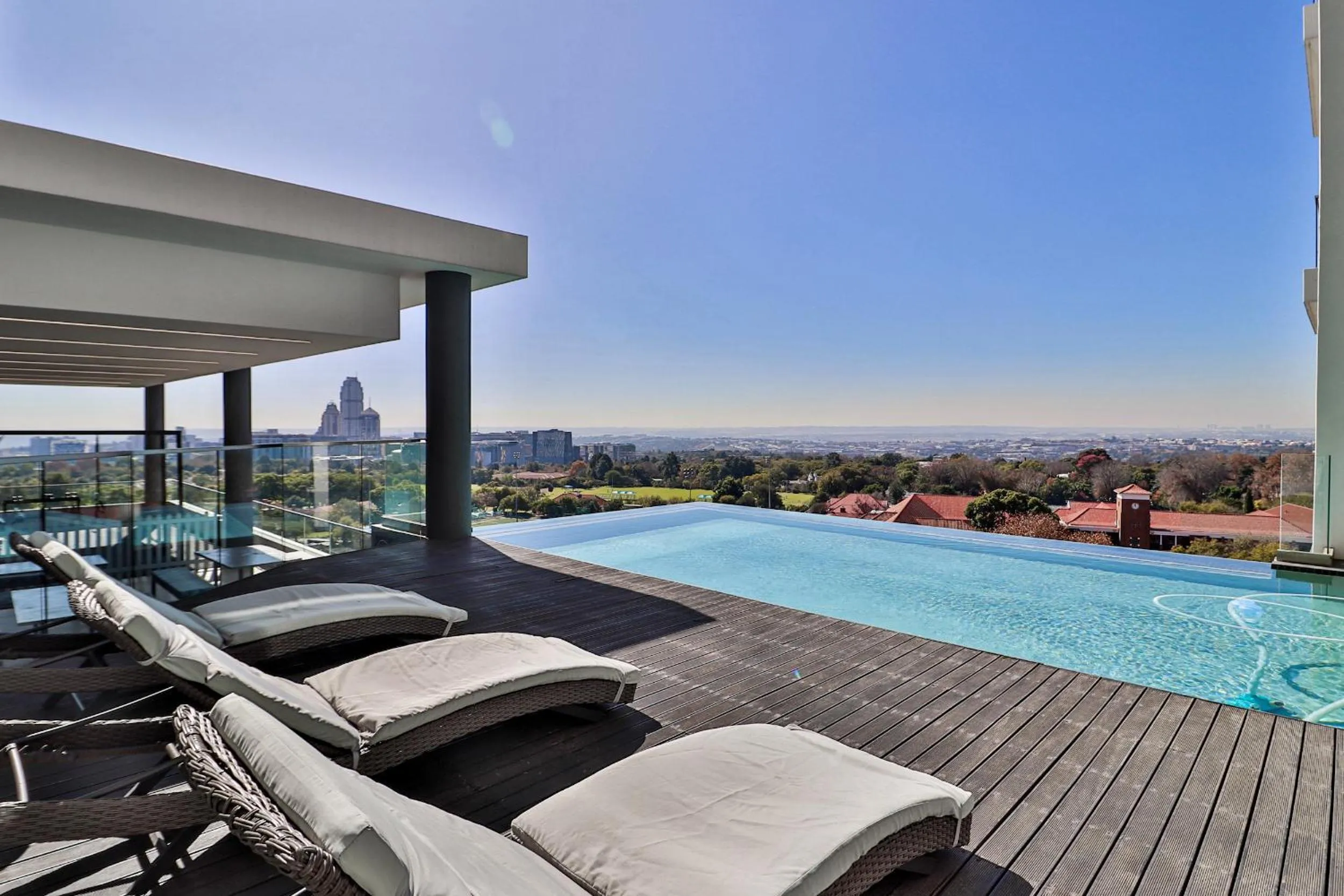 Swimming pool in Reserved Suites Illovo