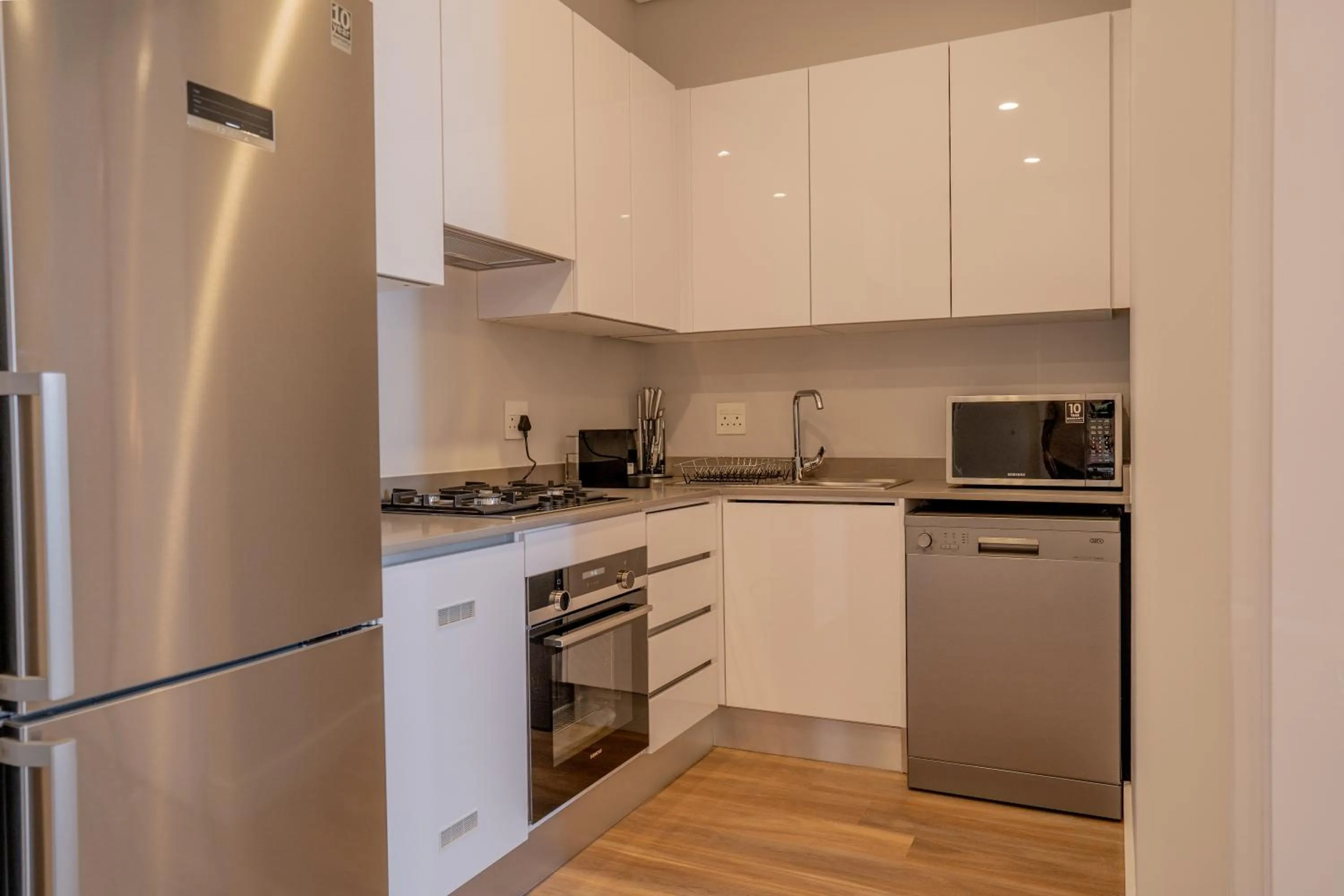 Kitchen or kitchenette in Reserved Suites Illovo