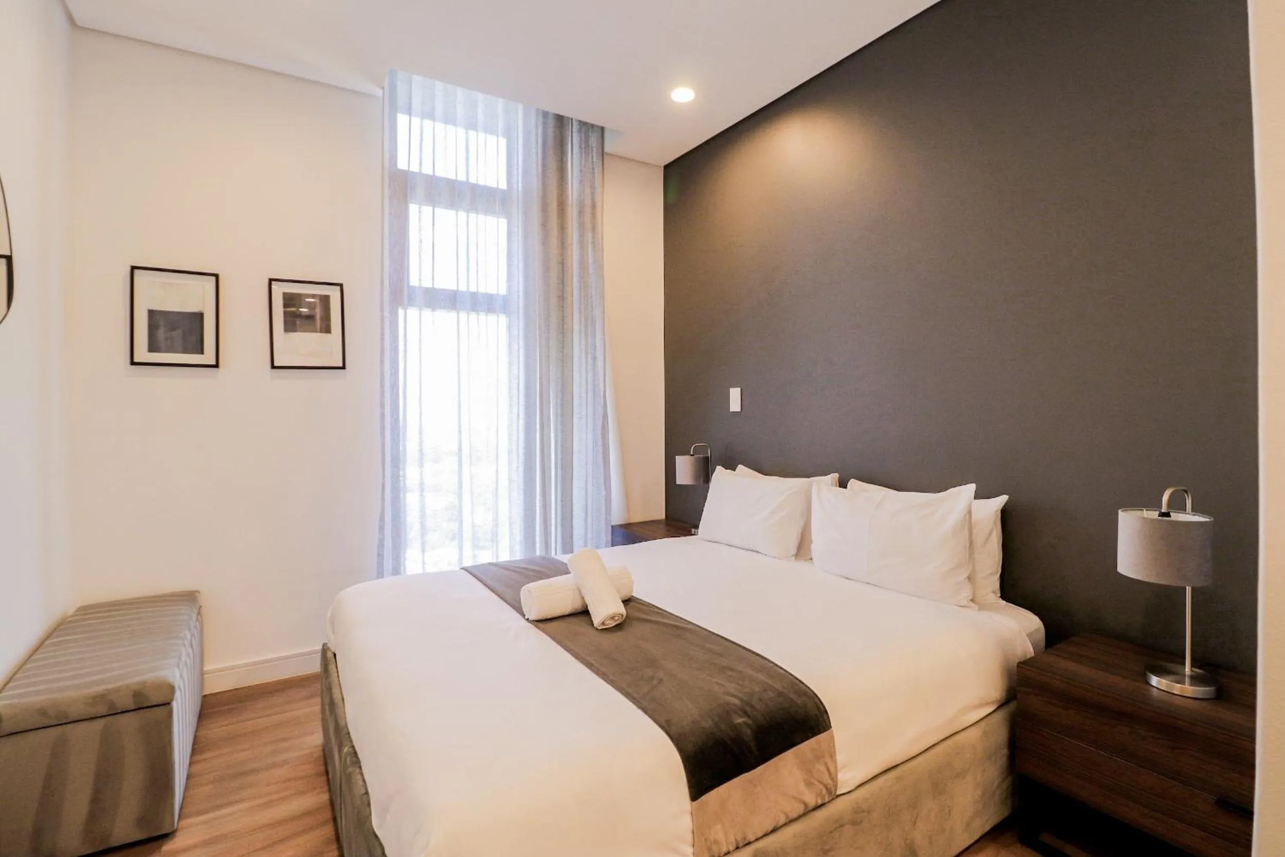 Bedroom, Bed in Reserved Suites Illovo