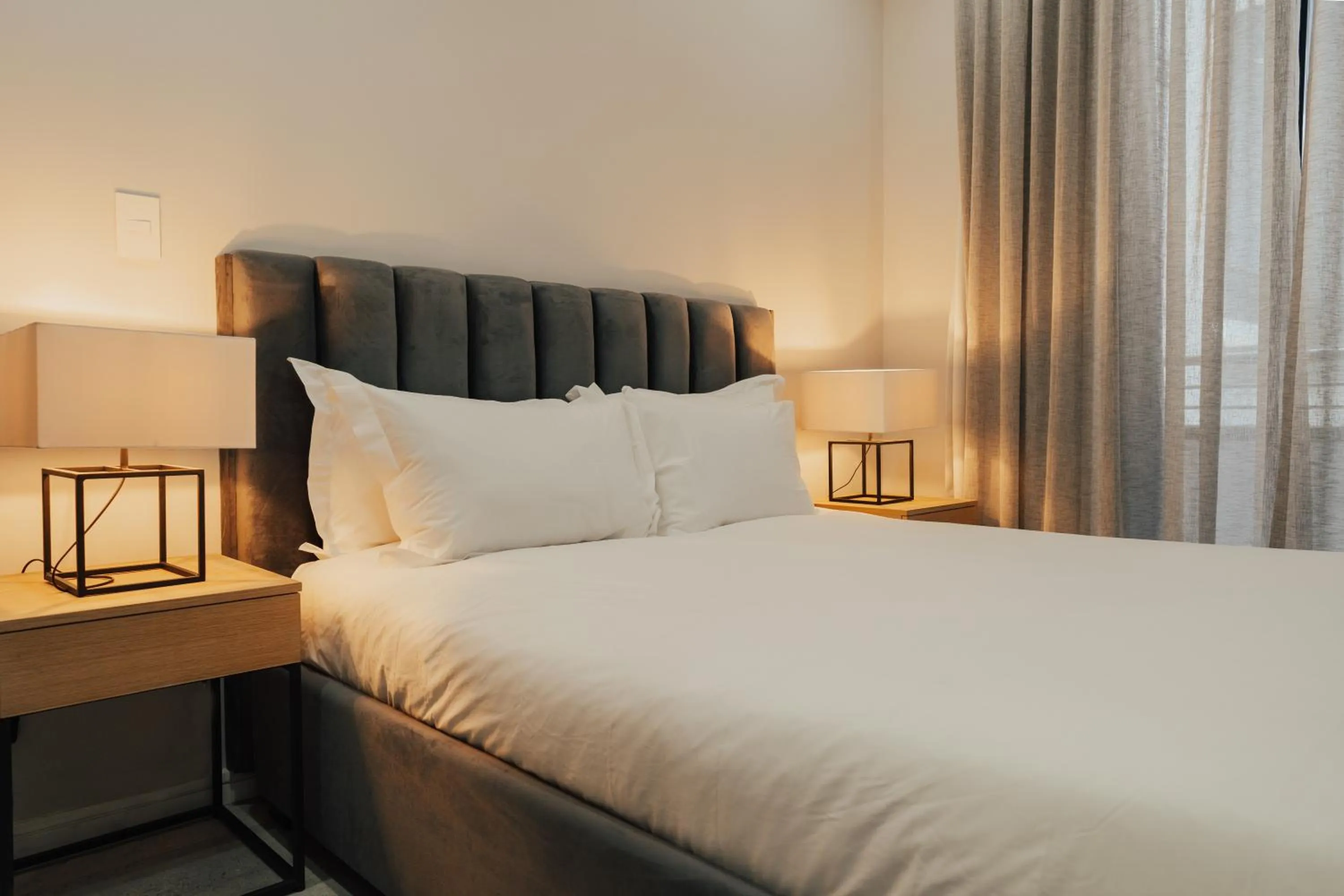 Bedroom, Bed in Reserved Suites Illovo