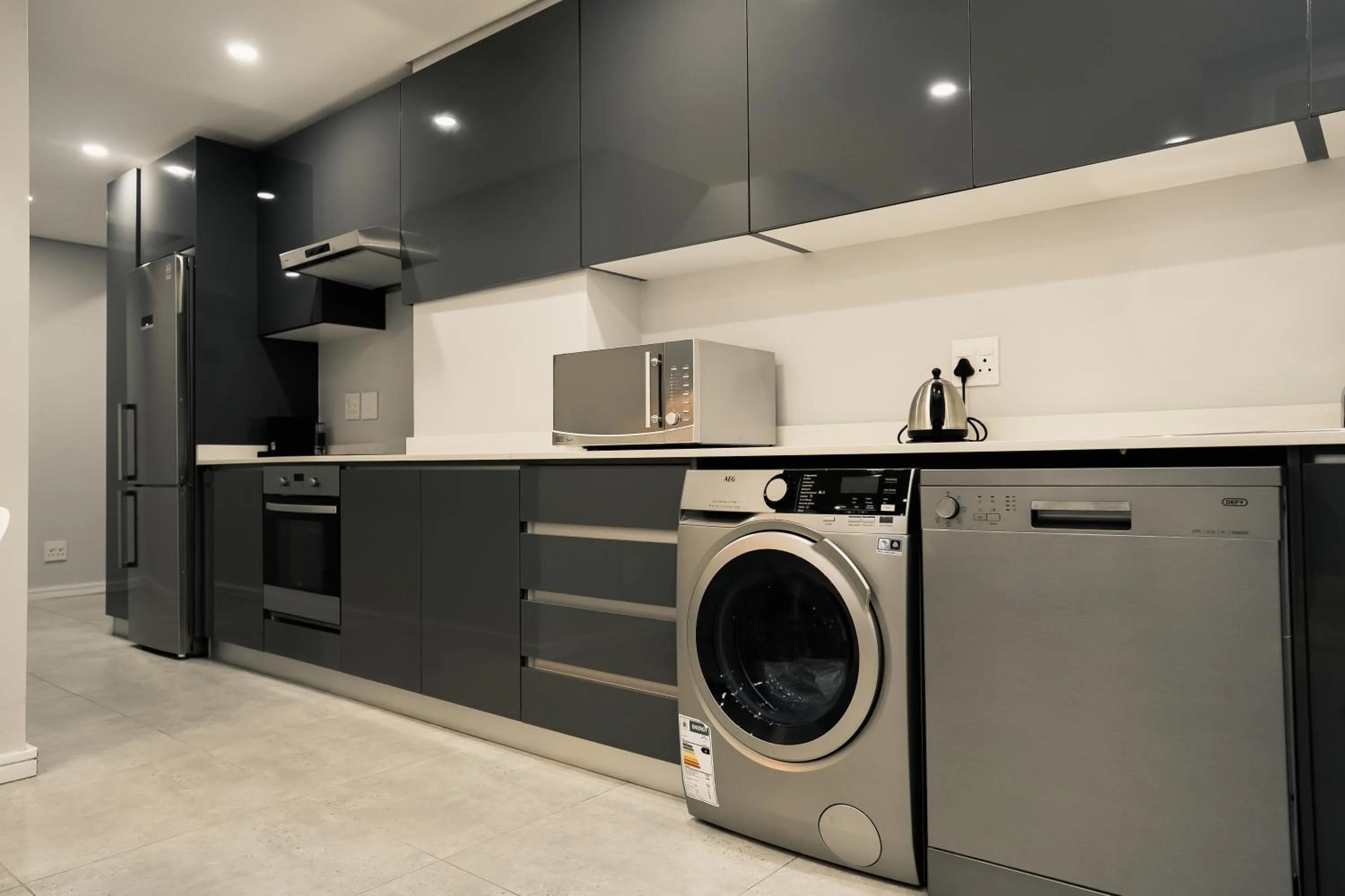 Kitchen or kitchenette in Reserved Suites Illovo