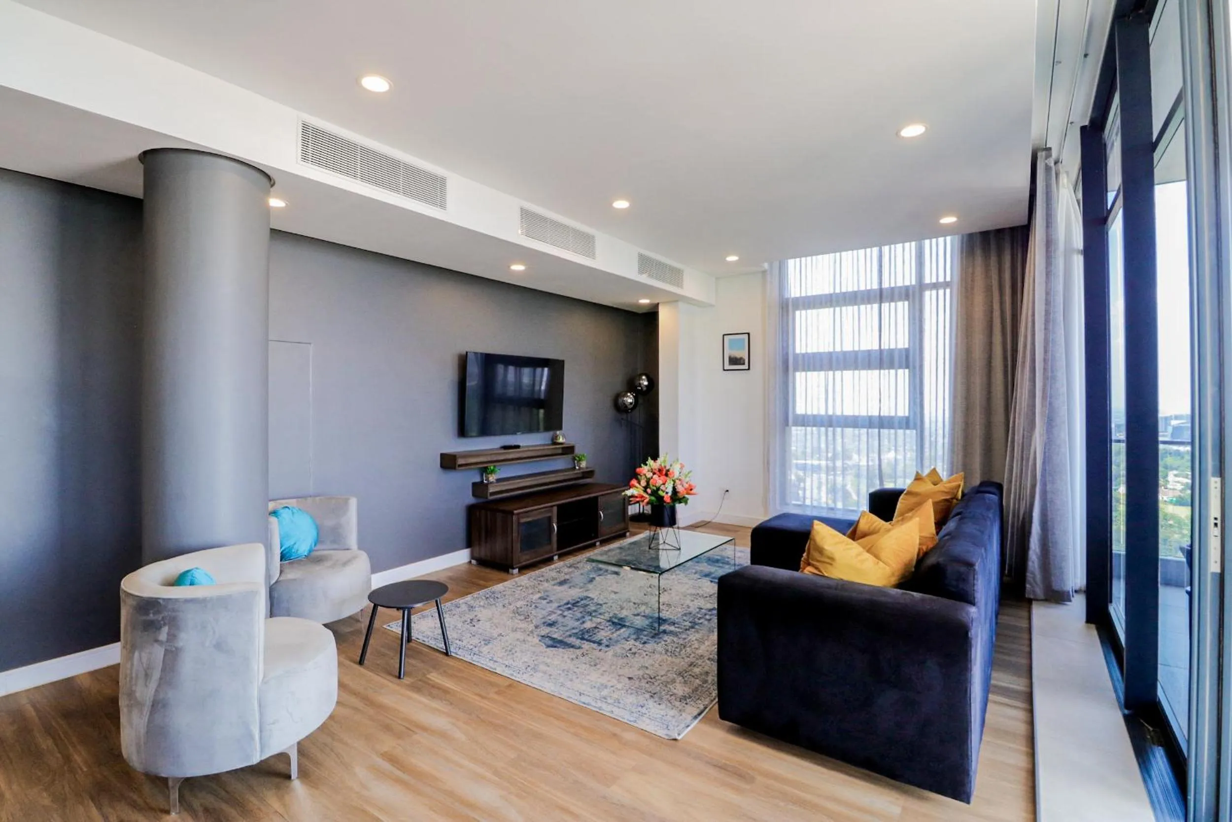 Seating area in Reserved Suites Illovo