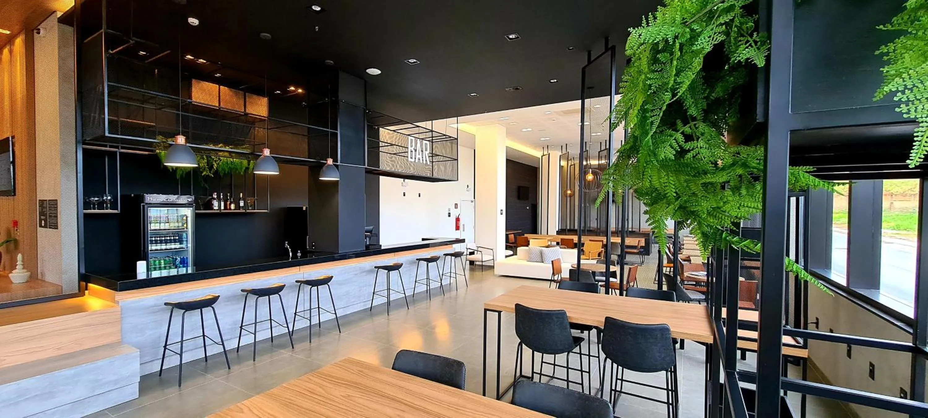 Lounge or bar in ibis Nova Serrana