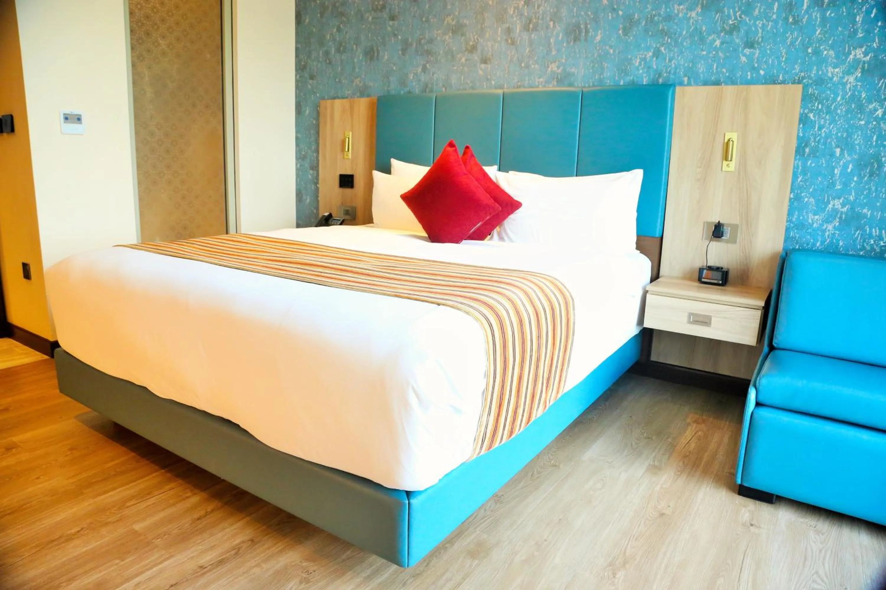 Bed in Golden Tulip Zanzibar Airport Hotel & Spa