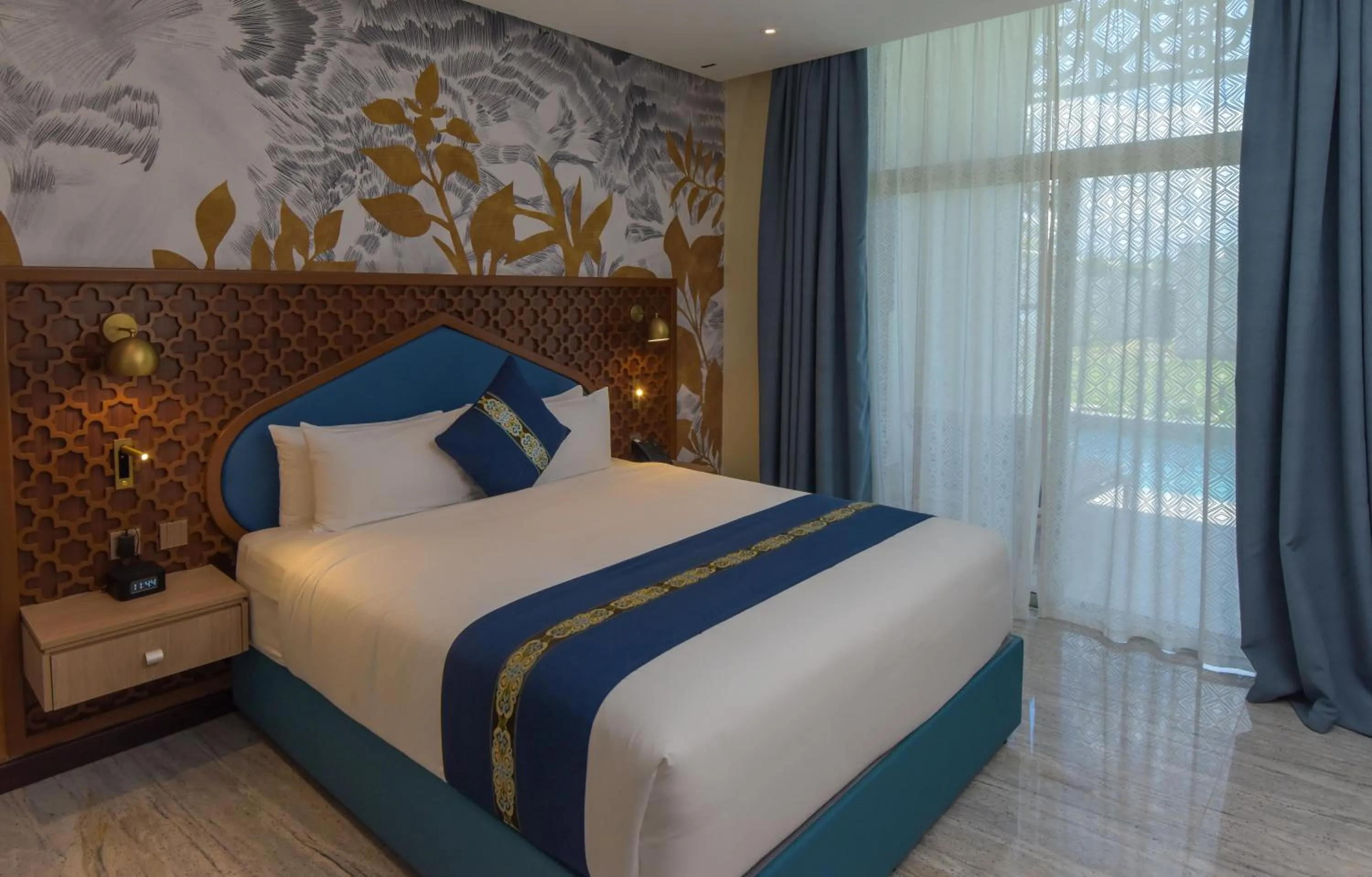 Bed in Golden Tulip Zanzibar Airport Hotel & Spa