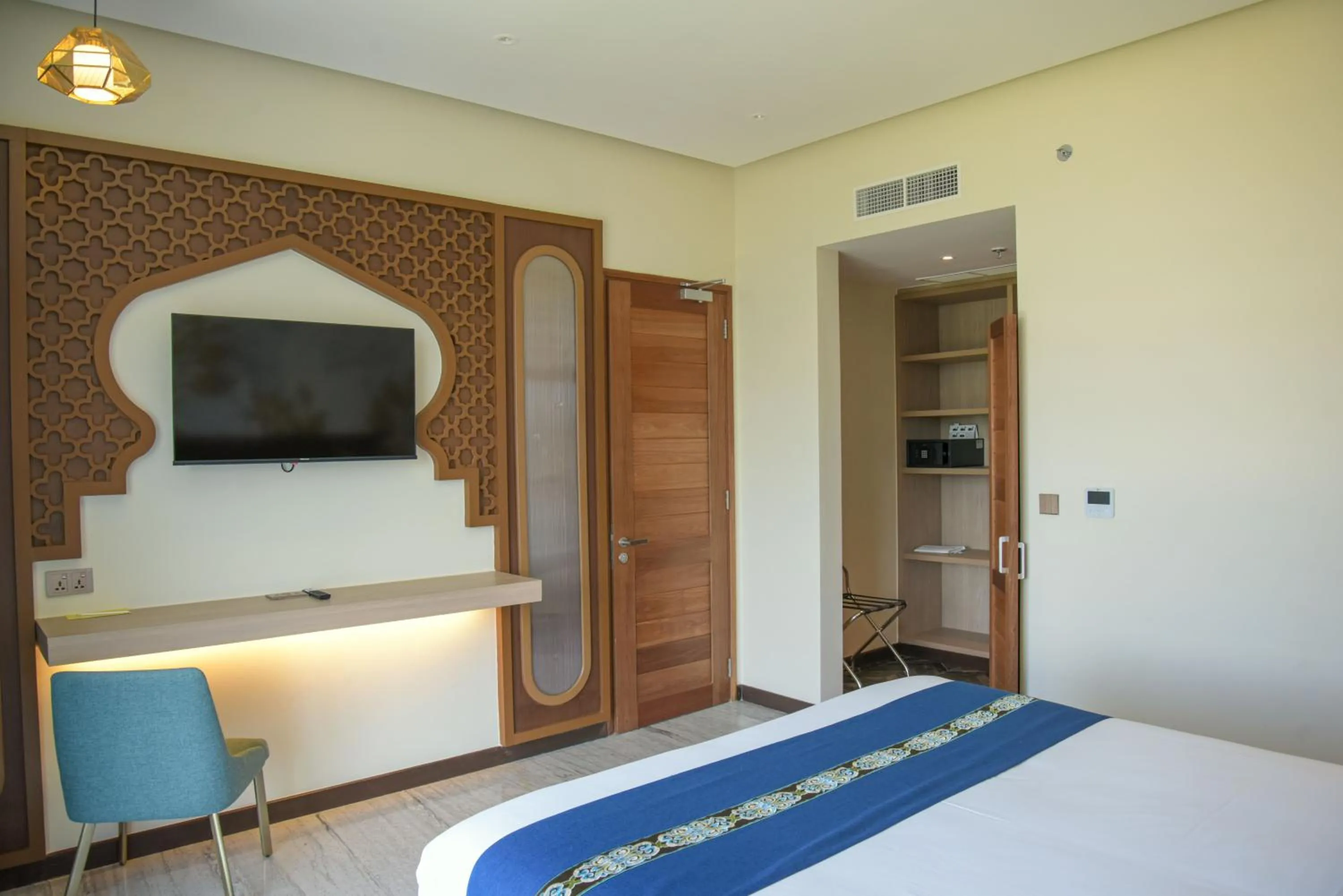 Bed in Golden Tulip Zanzibar Airport Hotel & Spa