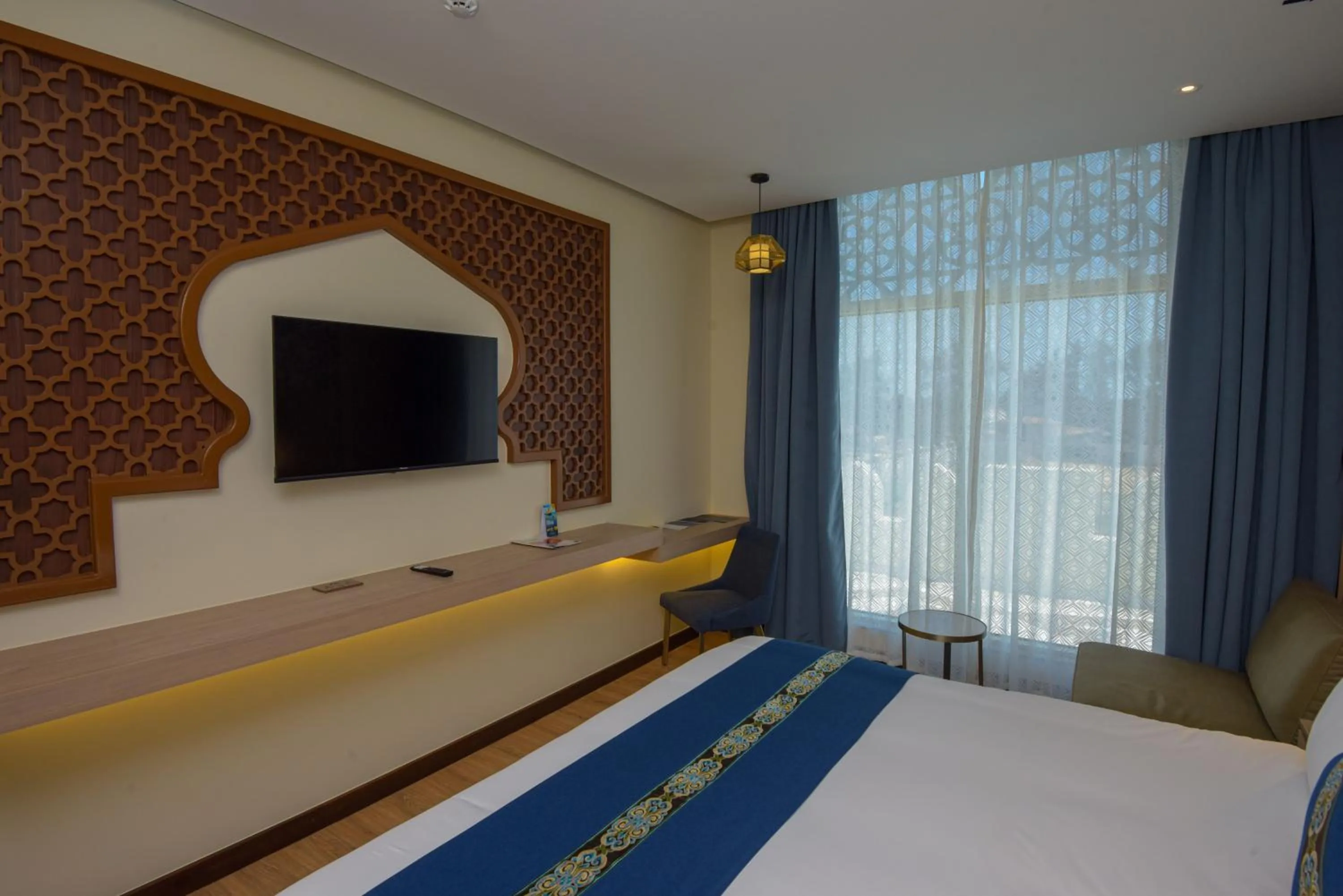 Swimming pool, Bed in Golden Tulip Zanzibar Airport Hotel & Spa