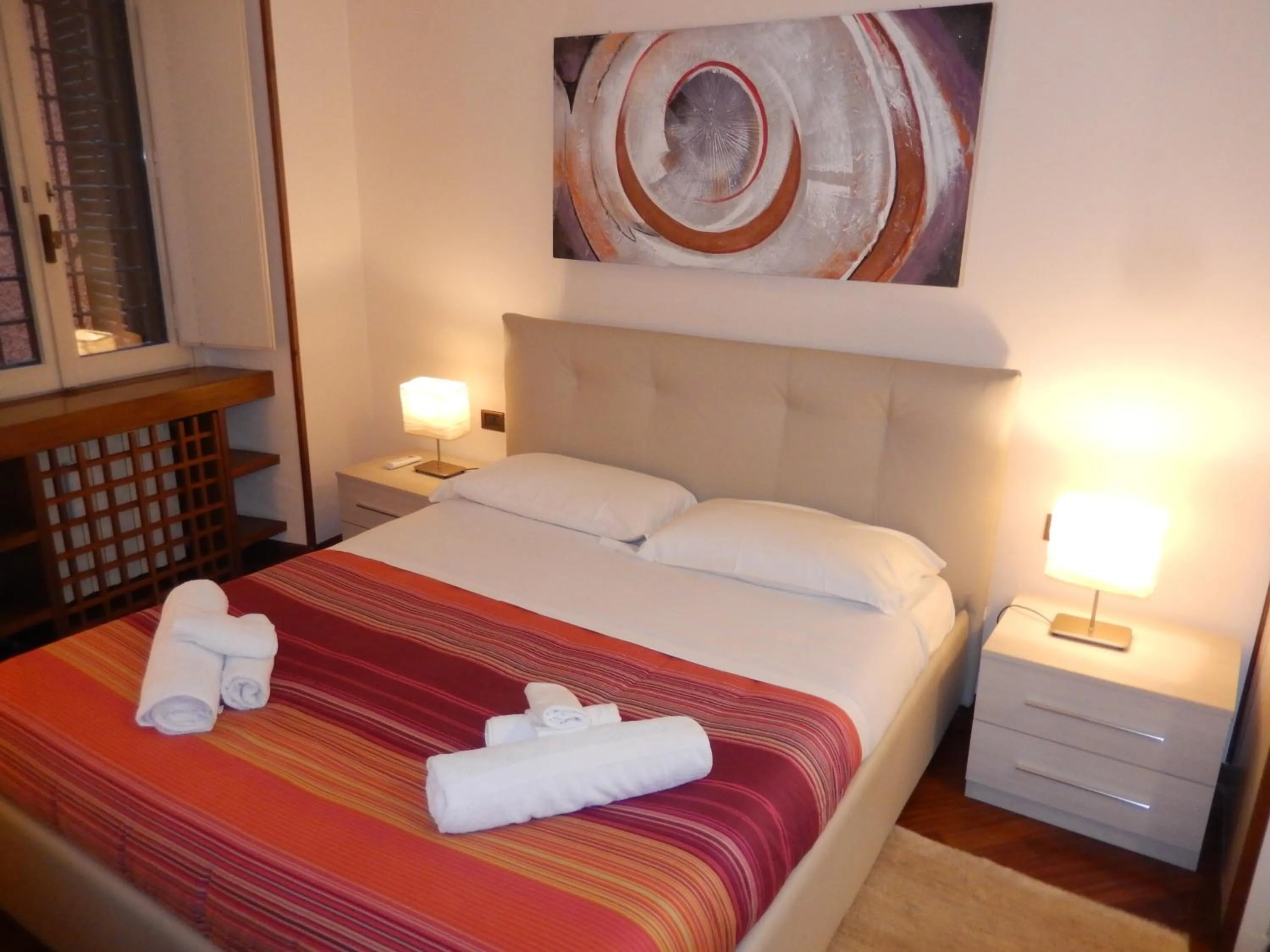 Bed in Colosseo Homerents 2
