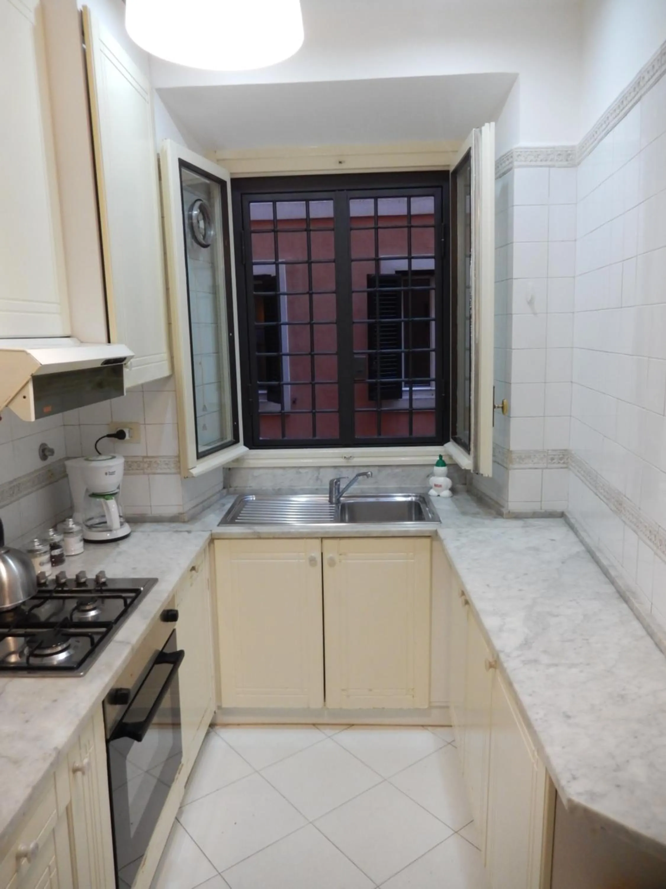 Kitchen or kitchenette in Colosseo Homerents 2
