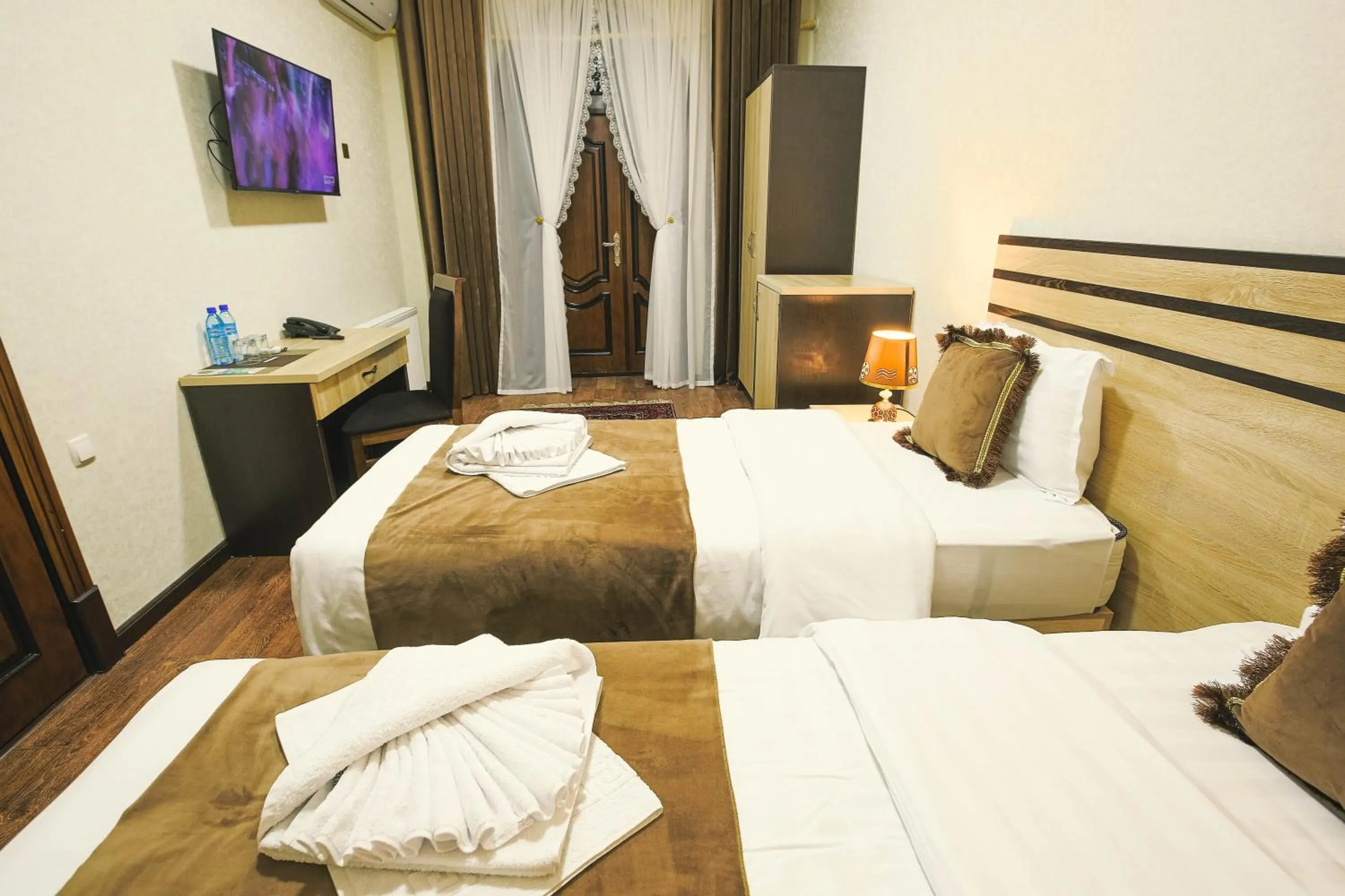 Photo of the whole room, Bed in Rayyan Hotel Bukhara