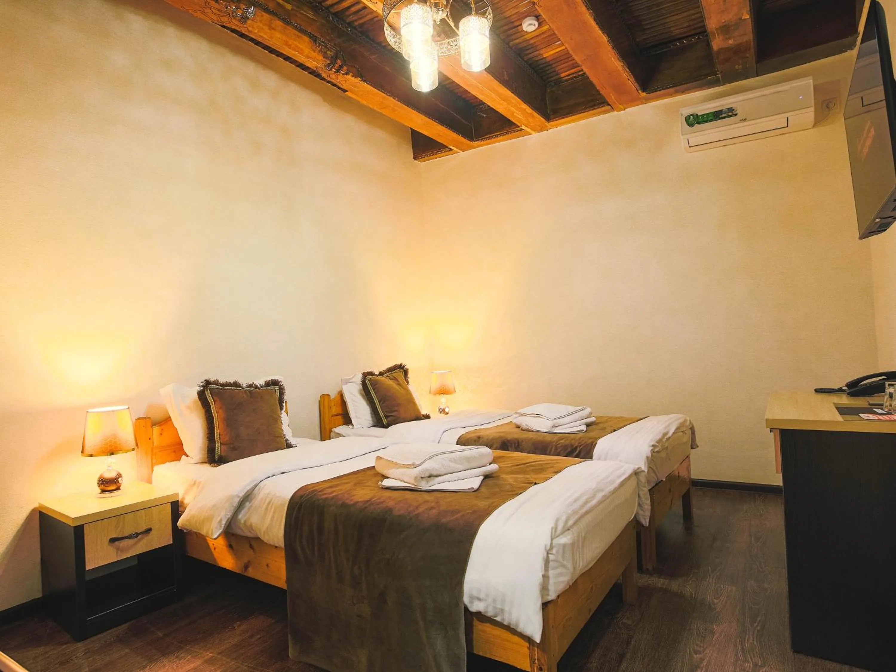 Bed in Rayyan Hotel Bukhara