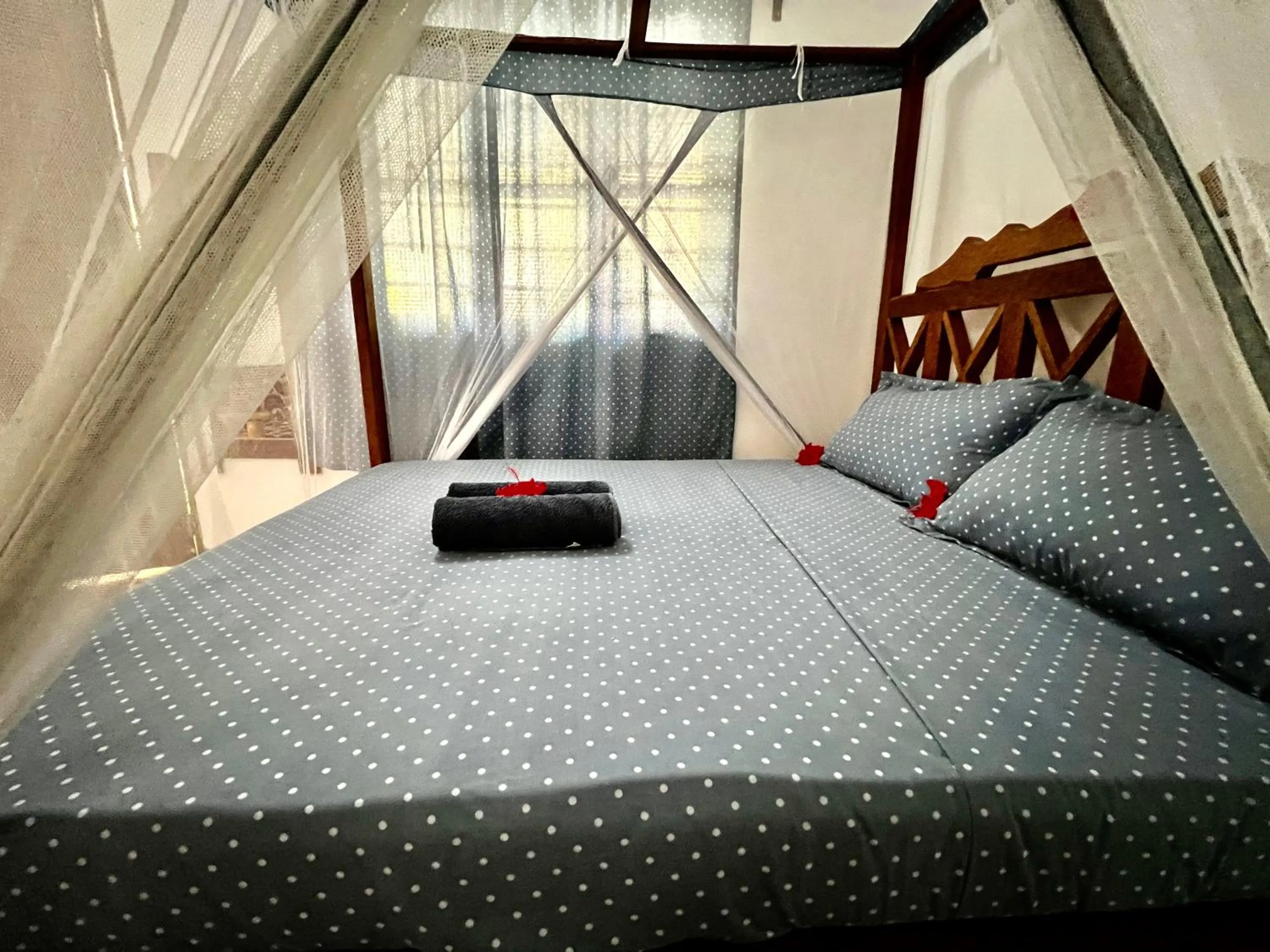 Bed in Chikachika Beach B&B