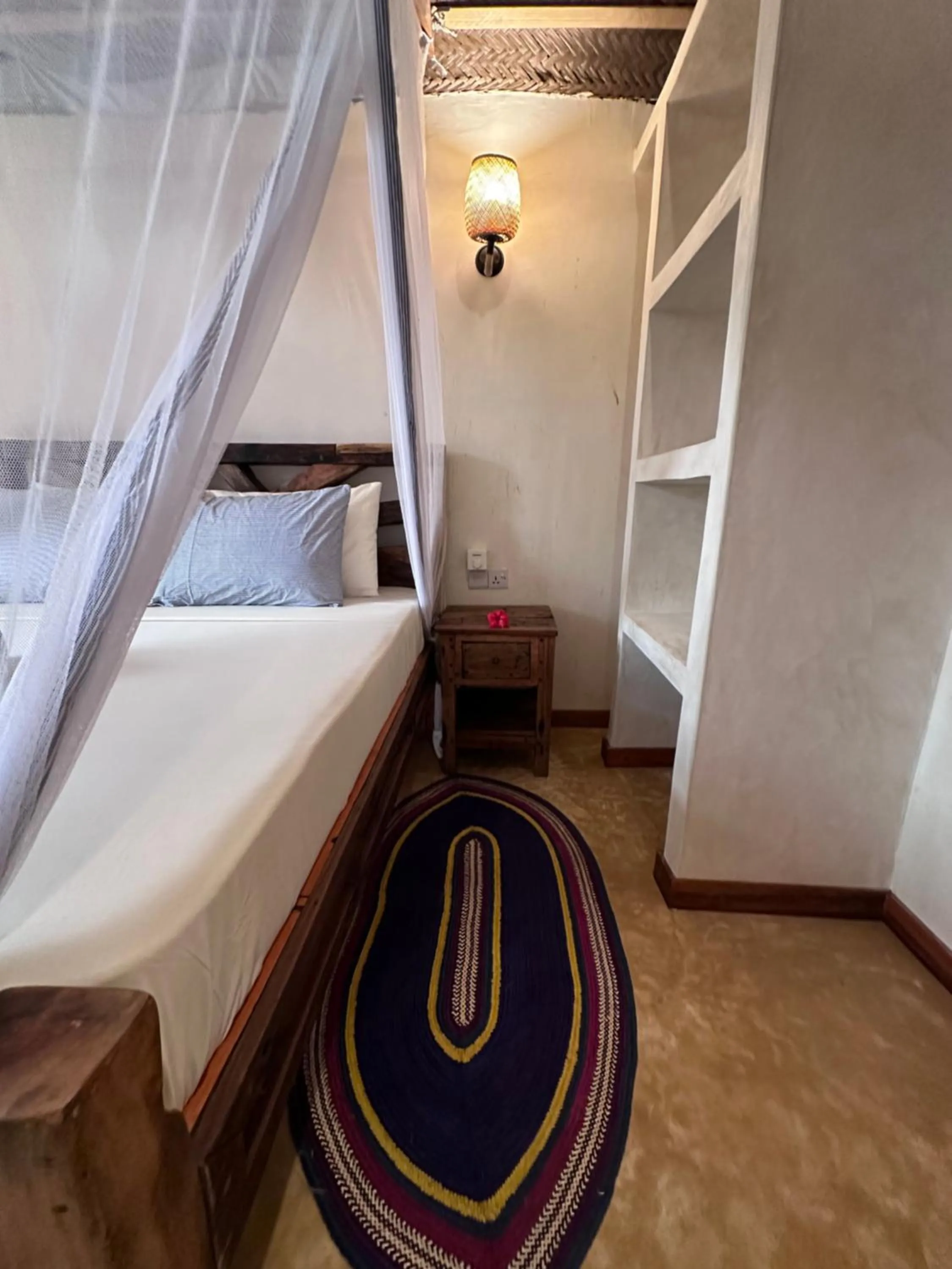 Bed in Chikachika Beach B&B