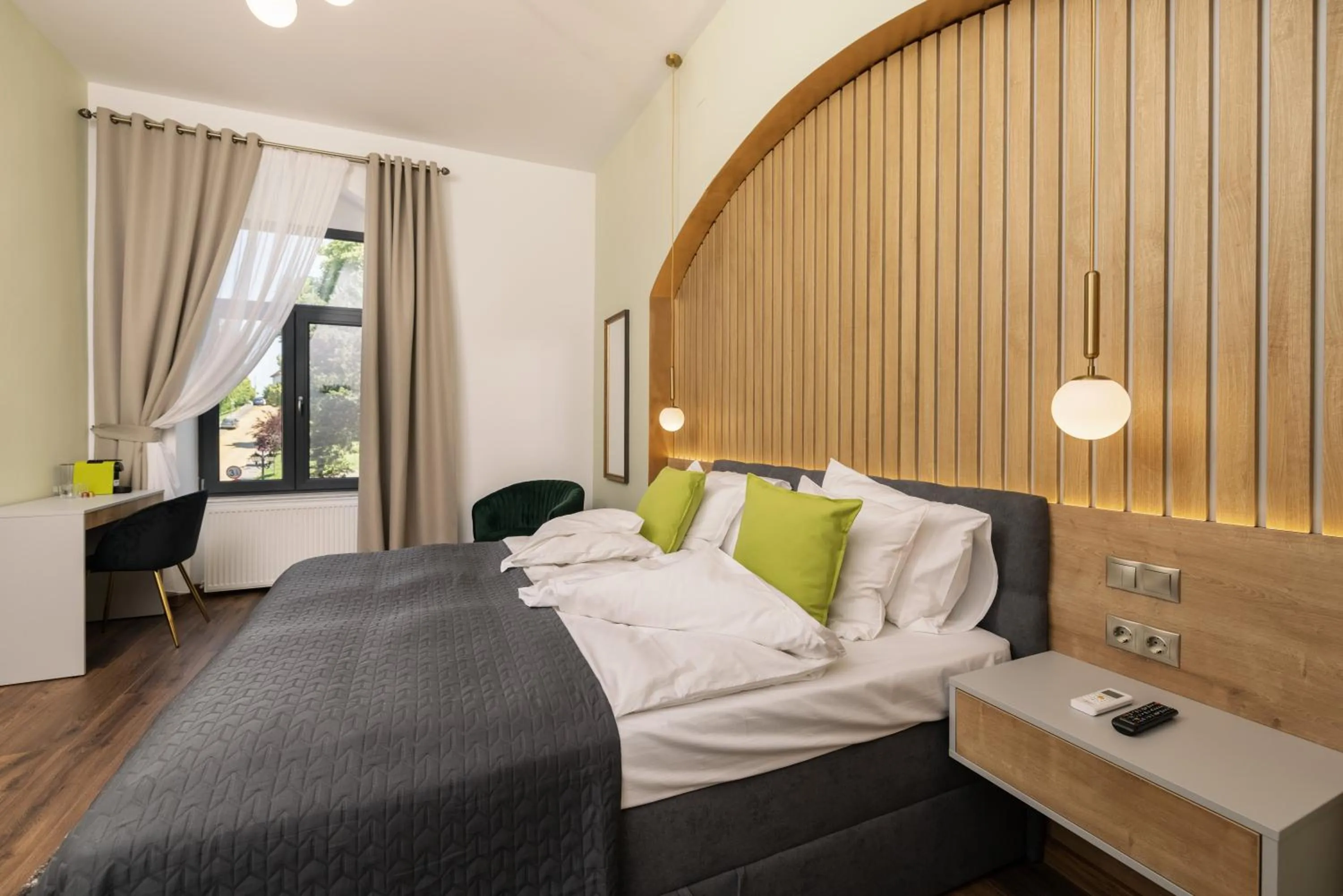 Photo of the whole room, Bed in Haller Boutique