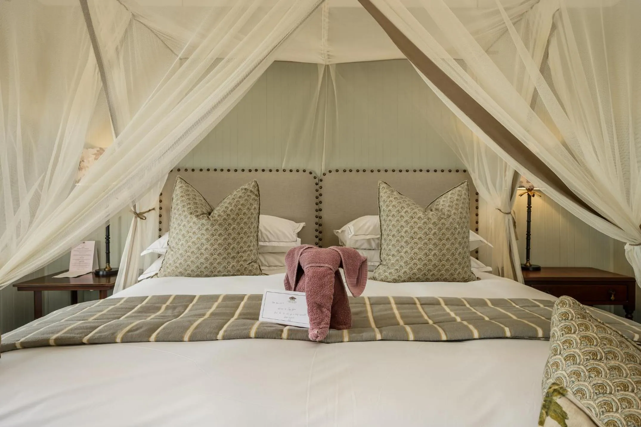 Bed in Camp Figtree by The Oyster Collection