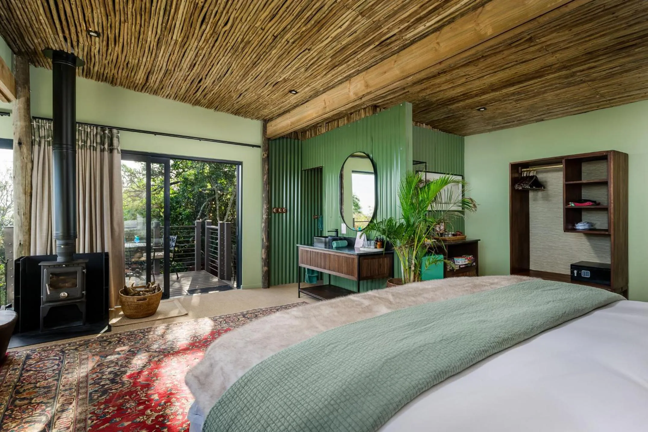 Bed in Camp Figtree by The Oyster Collection