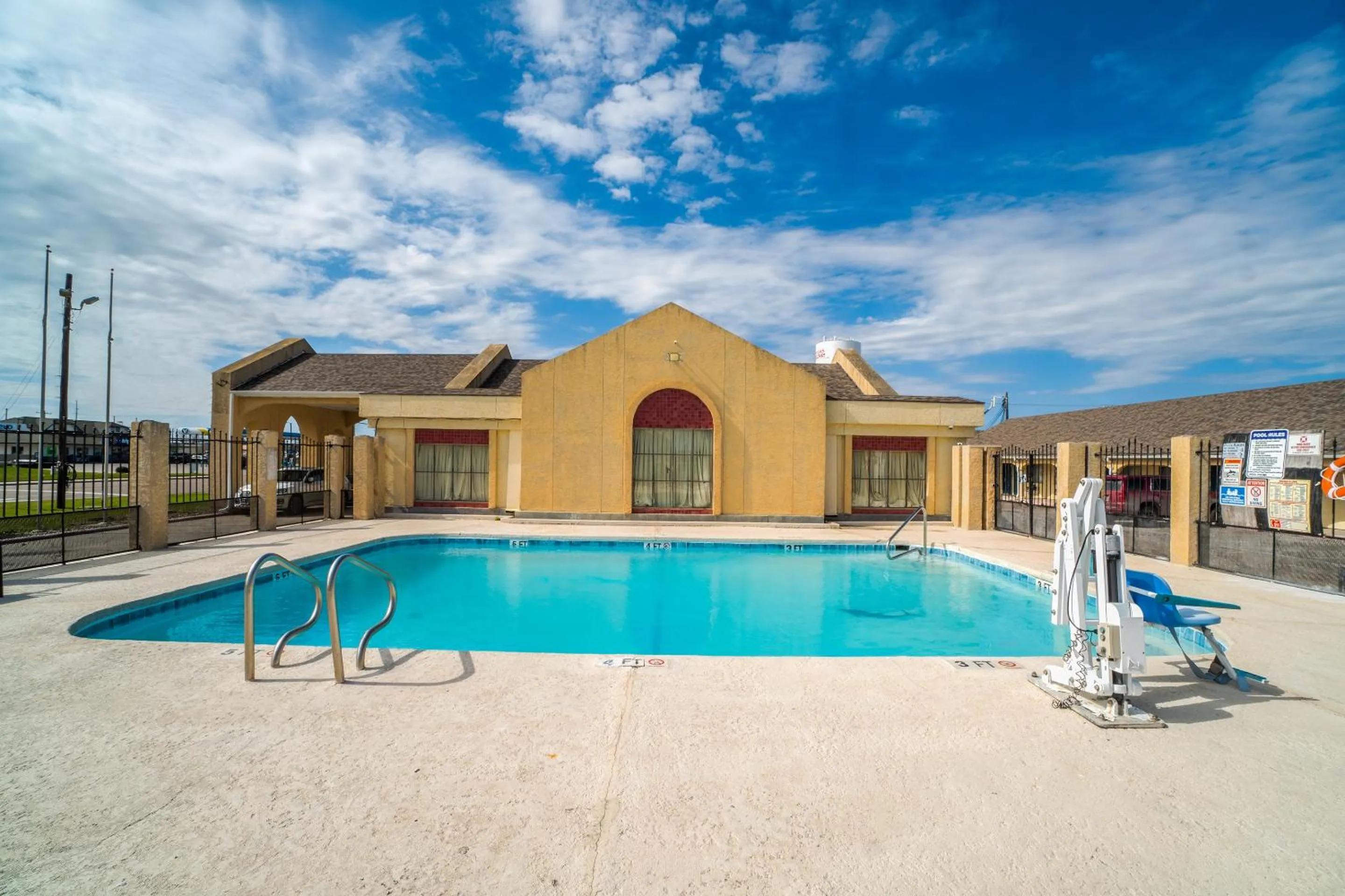 Swimming pool in Aransas Bay Inn & Suites Corpus Christi by OYO