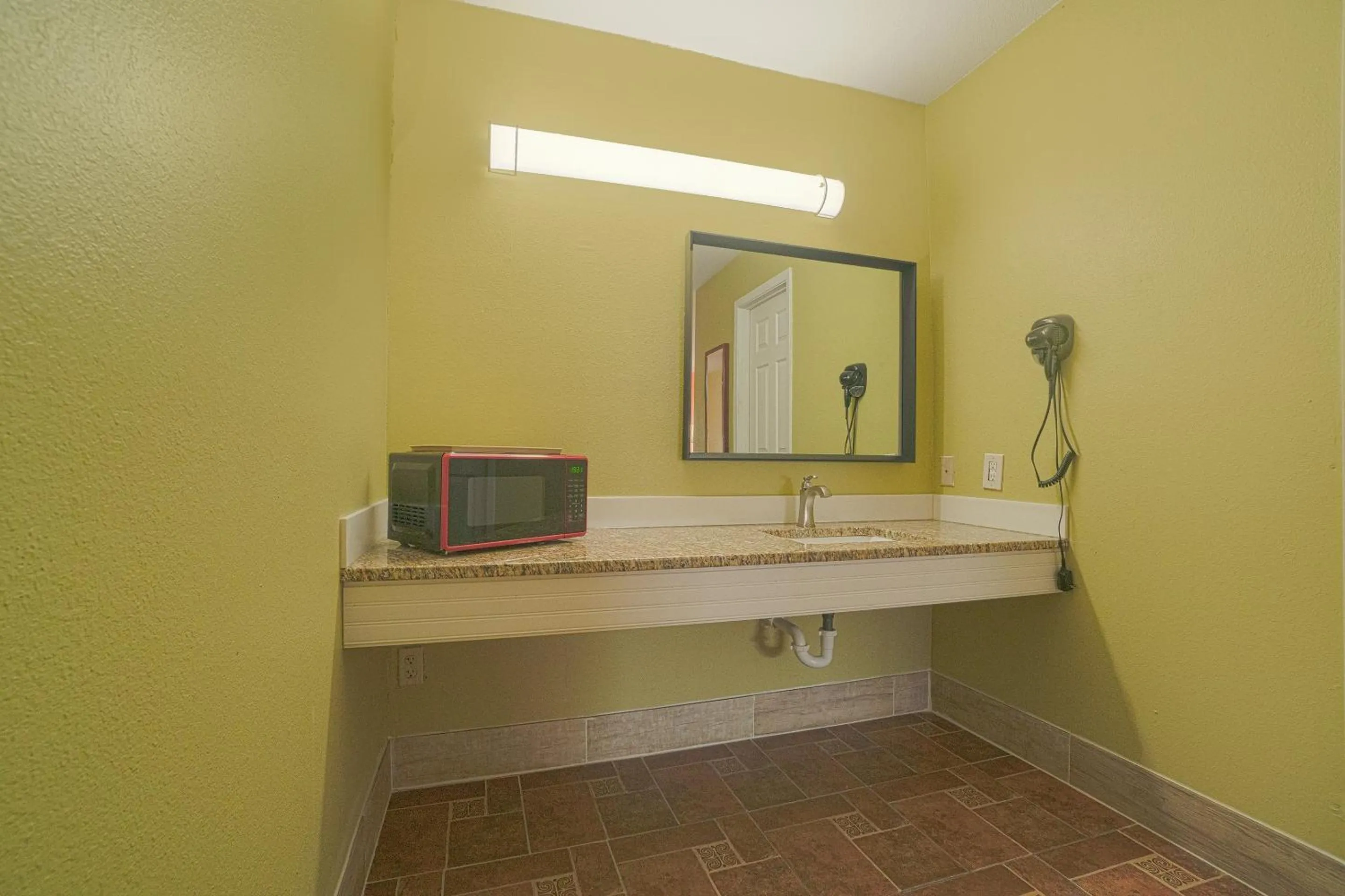 Bathroom in Aransas Bay Inn & Suites Corpus Christi by OYO