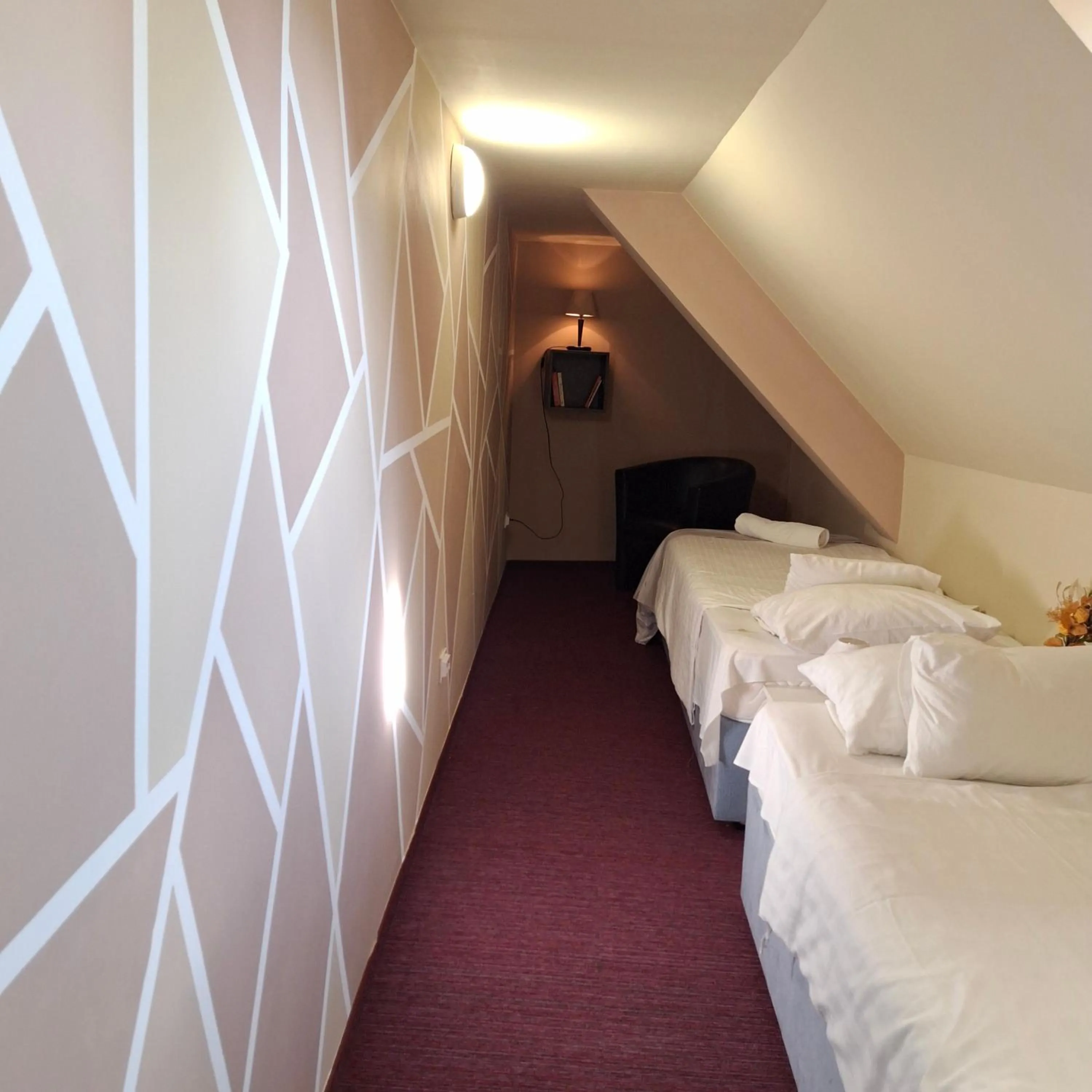 Bed in Hotel Unicornis