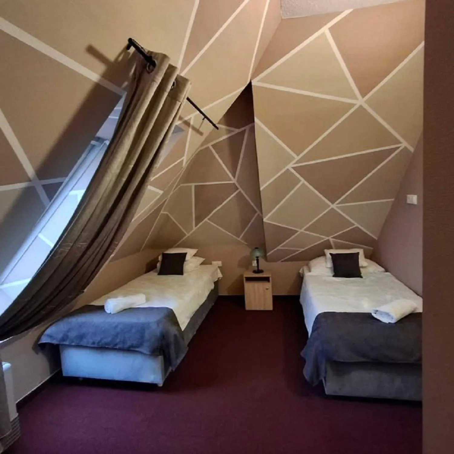 Bed in Hotel Unicornis