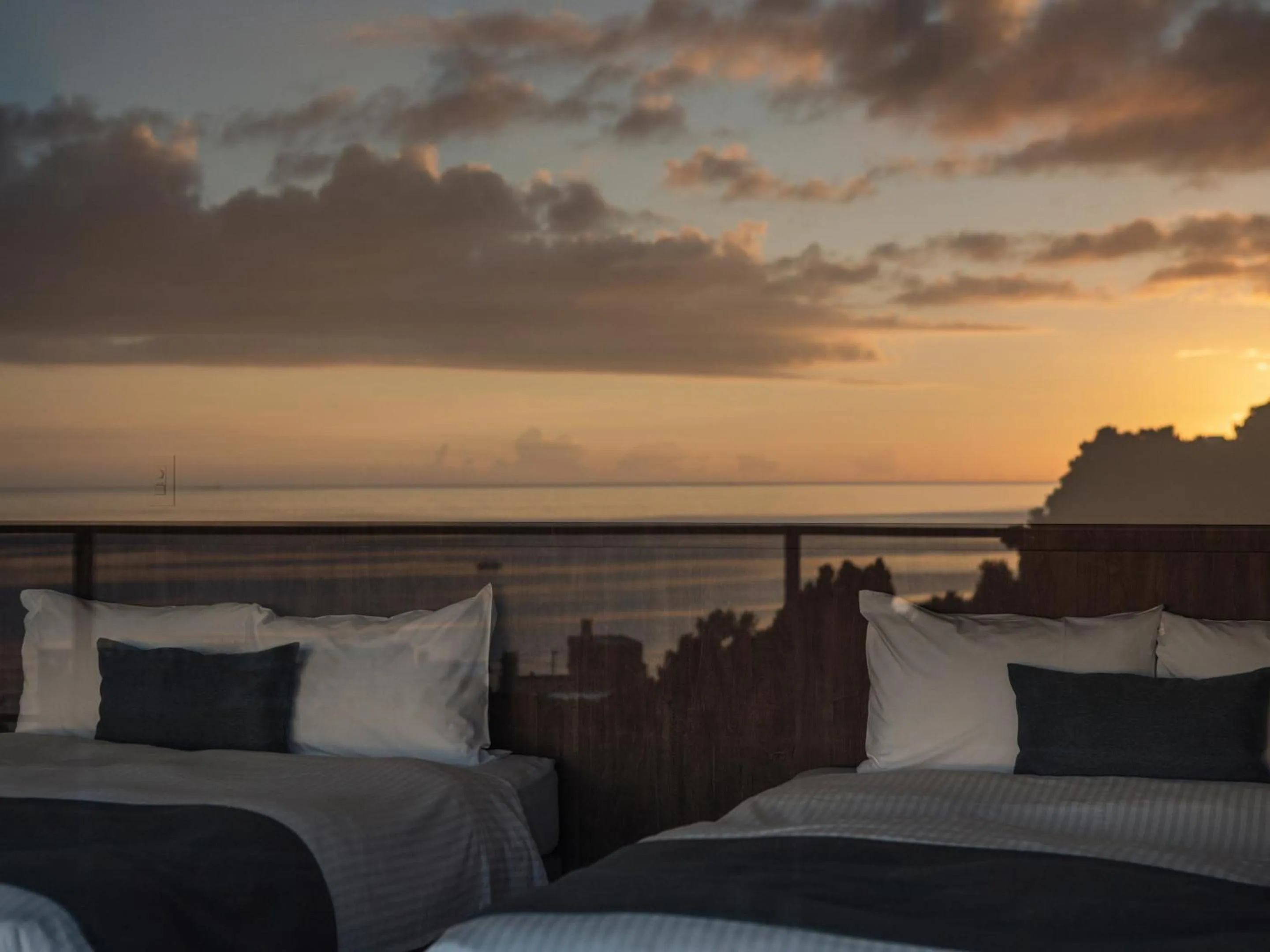 Bed in Blue Rela Luxe Resort Okinawa