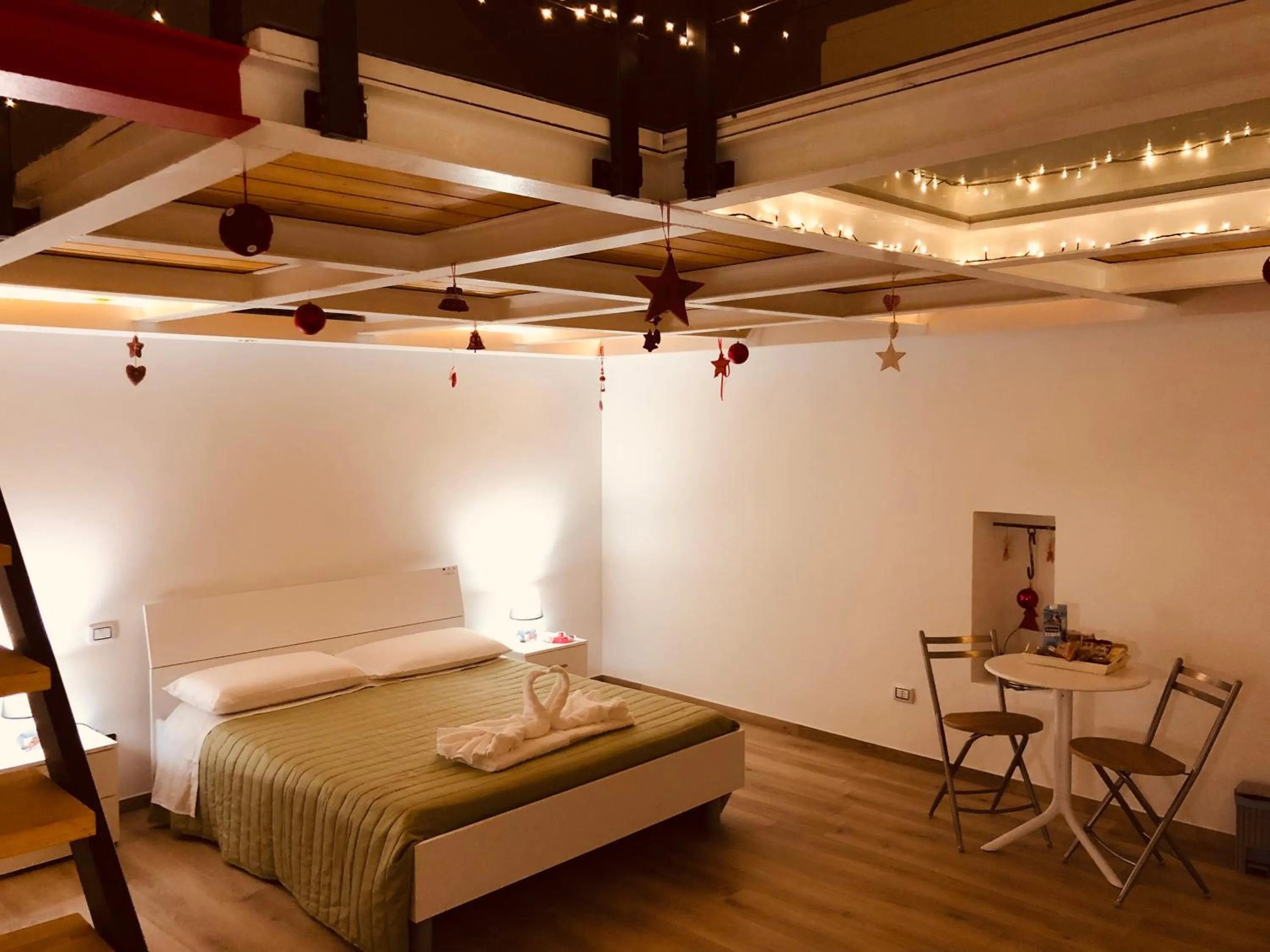 Bed in Mastropaolo42 Luxury B&B