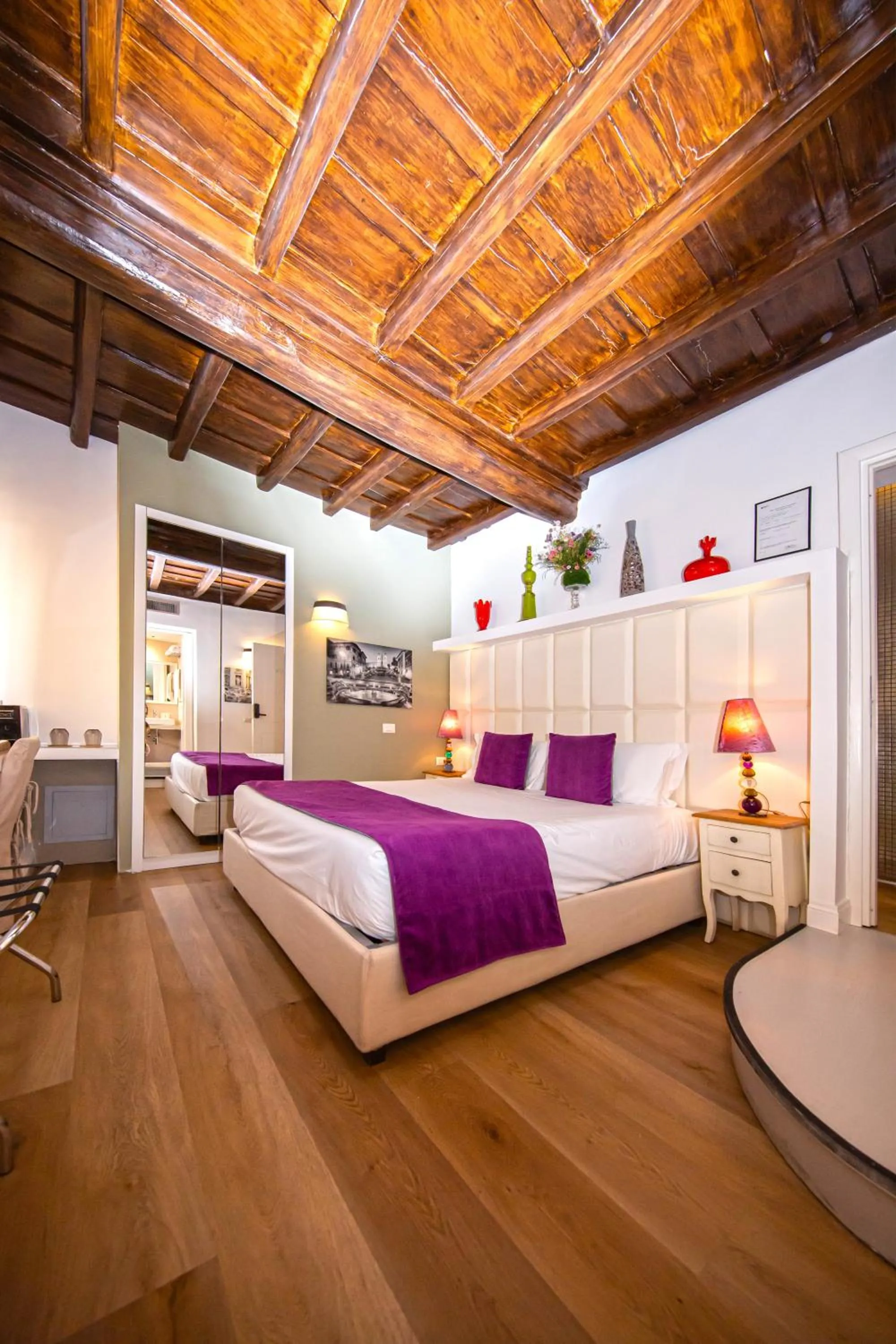 Bed in Corso Suite 107 Rooms Wellness & Spa