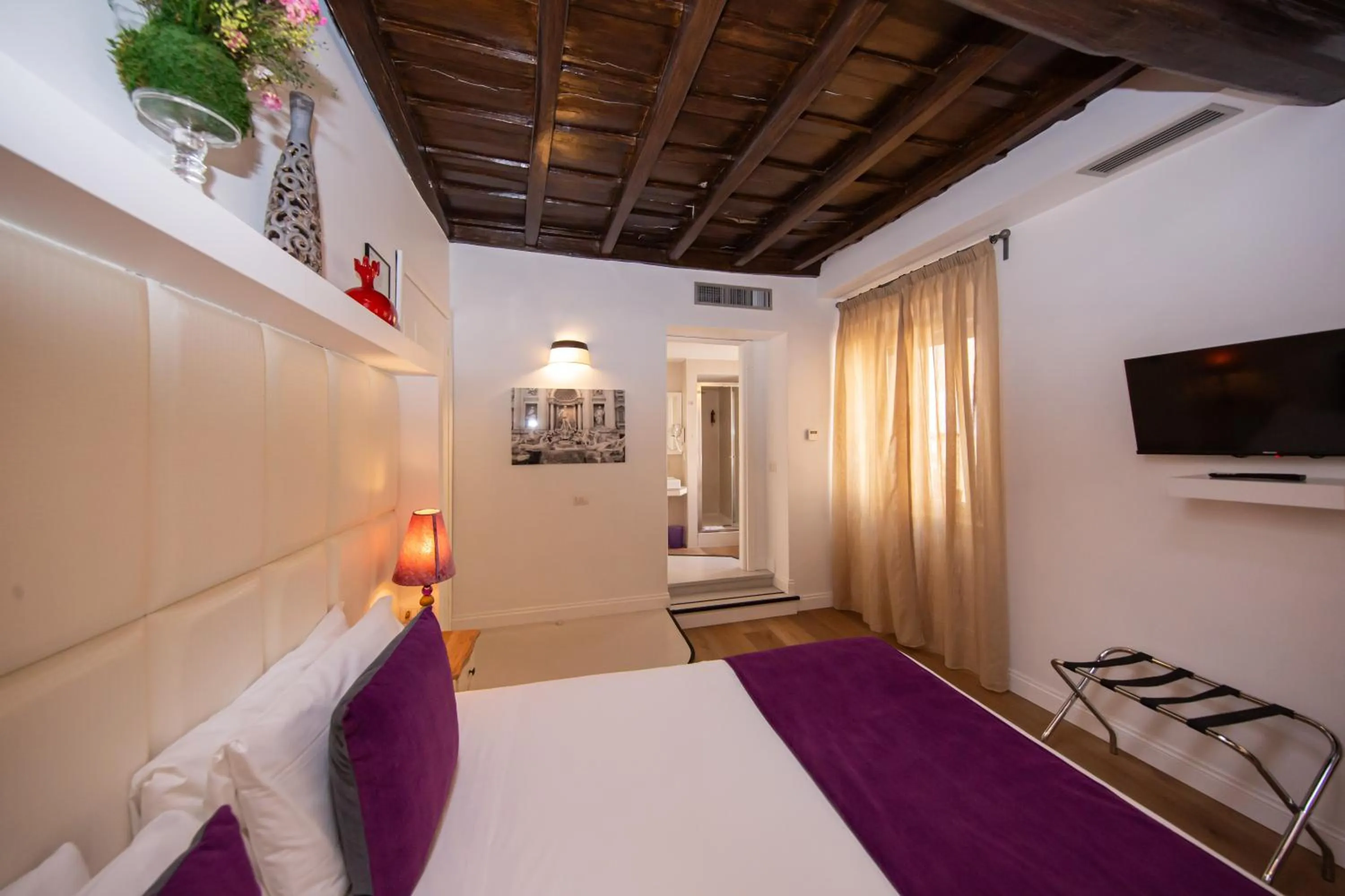 Bed in Corso Suite 107 Rooms Wellness & Spa