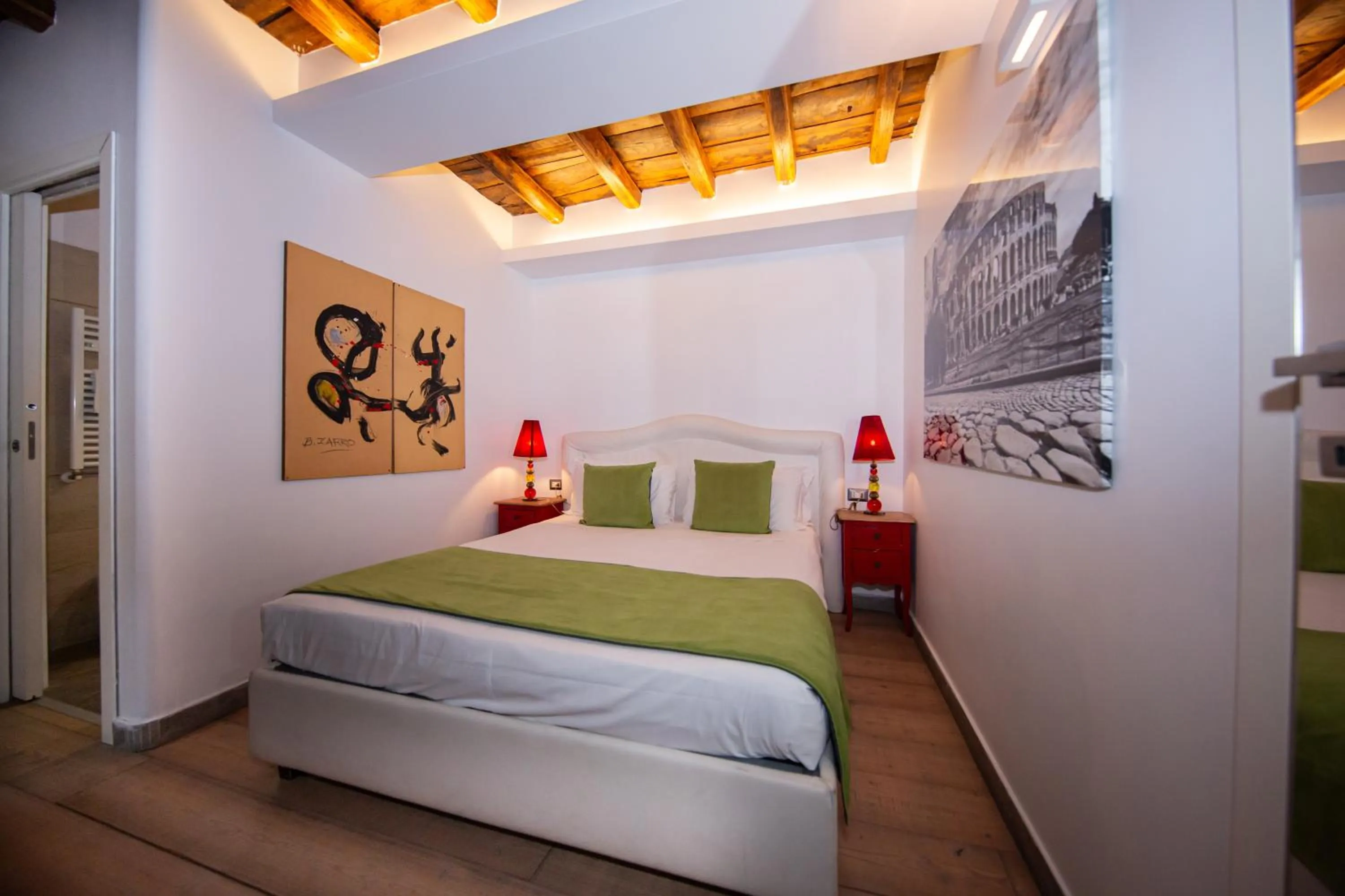 Bed in Corso Suite 107 Rooms Wellness & Spa